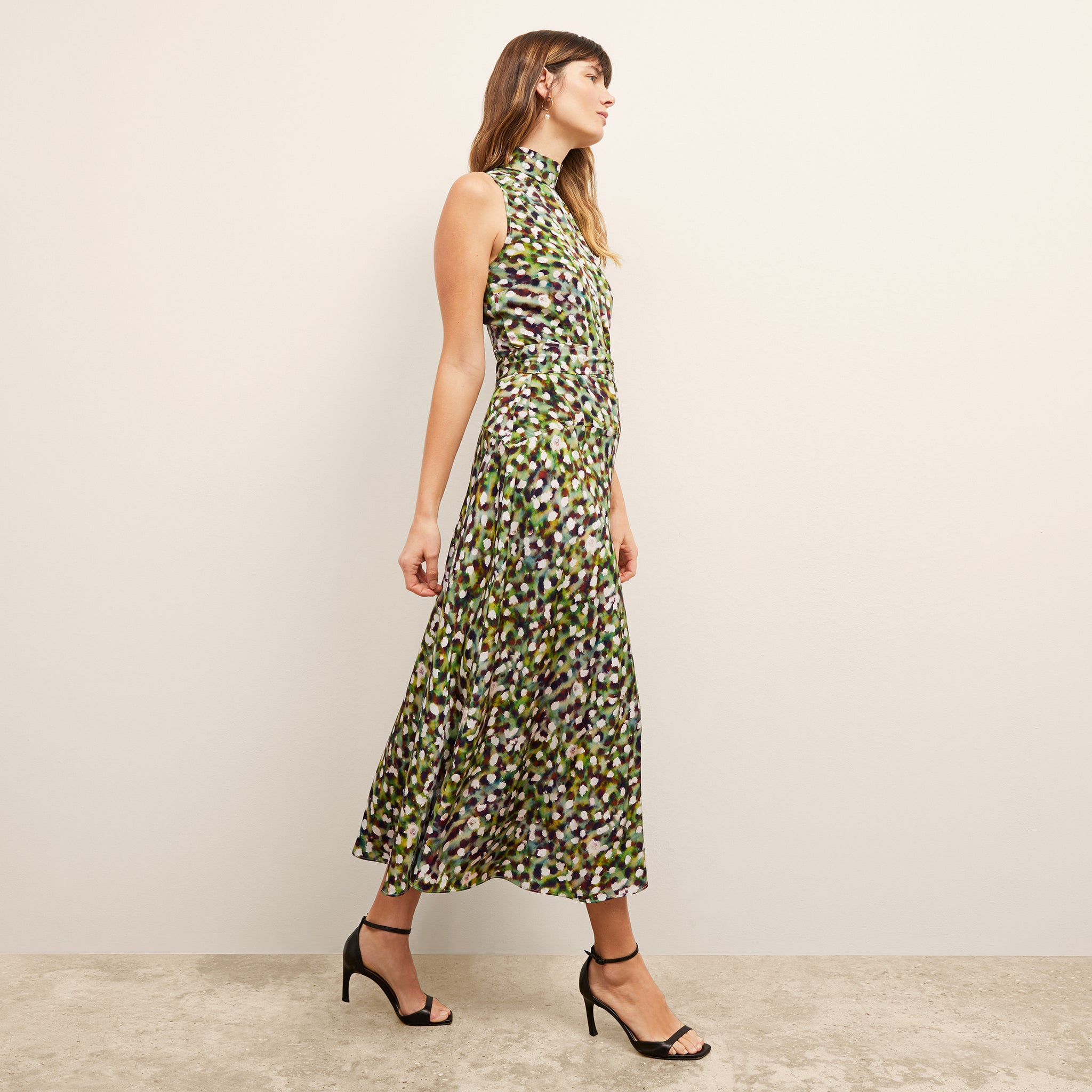 front image of a woman wearing the martina dress in spotlight print