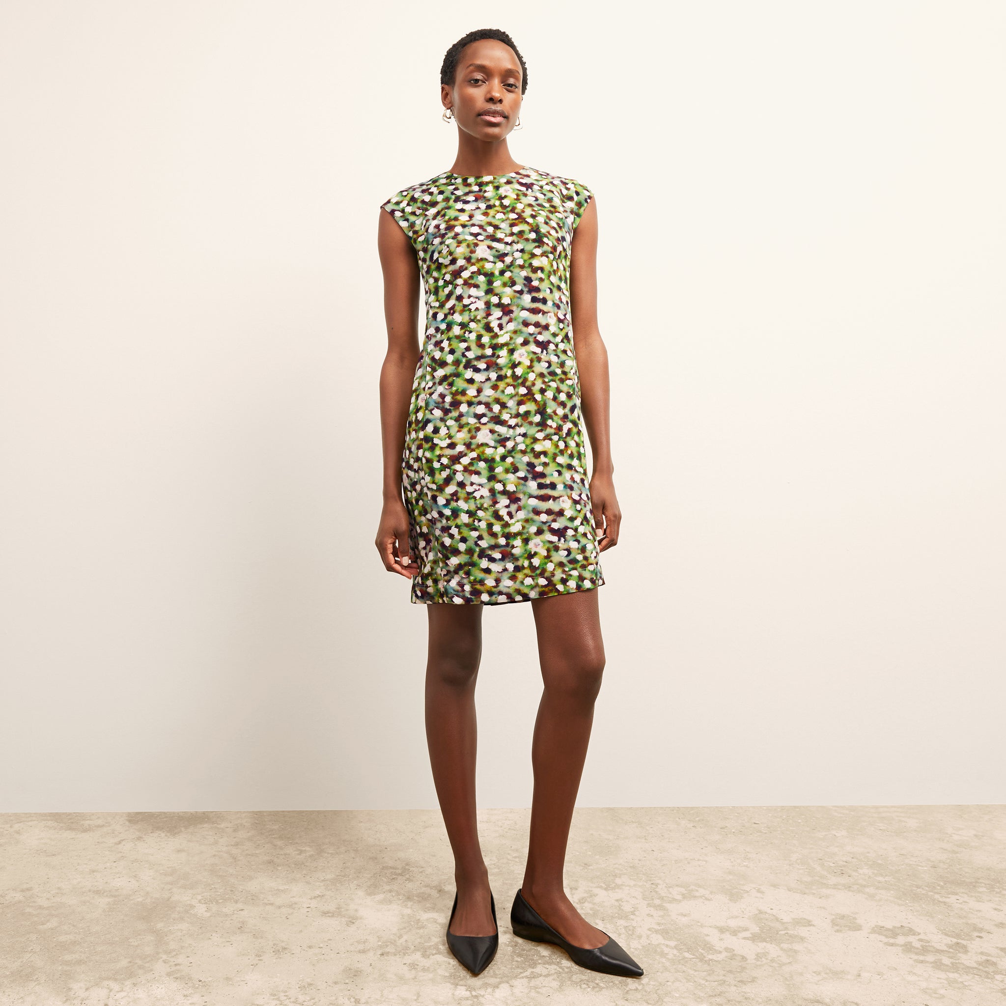 front image of a woman wearing the maaza dress in spotlight print 