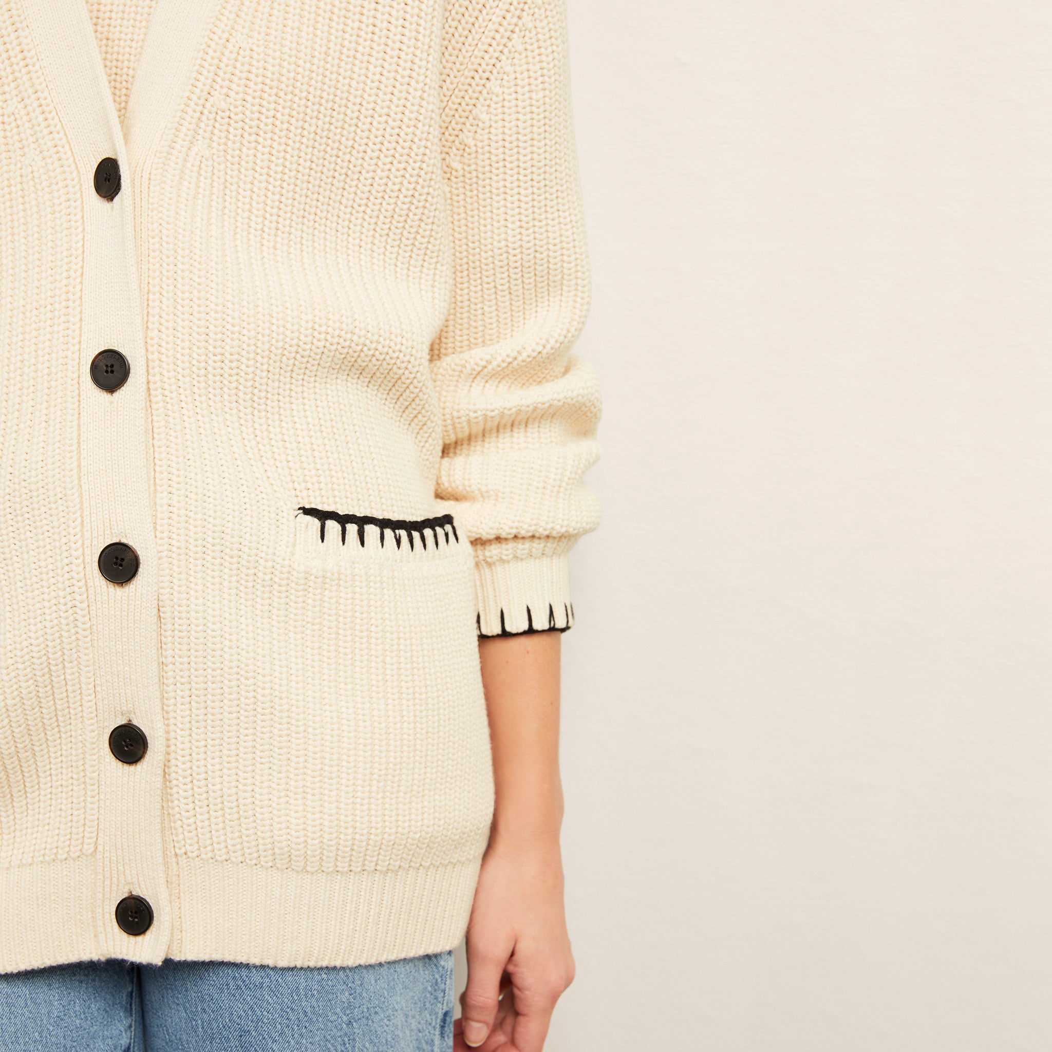 front image of a woman wearing the cookie cardigan in contrast knit