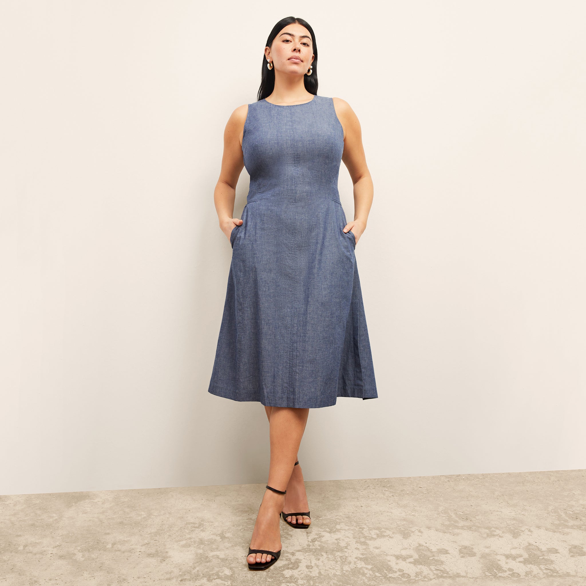front image of the estela dress in clear blue