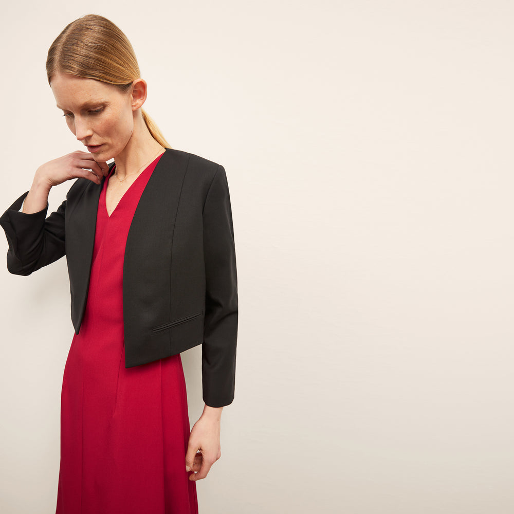 front image of a woman wearing the jaycie dess in rhubarb
