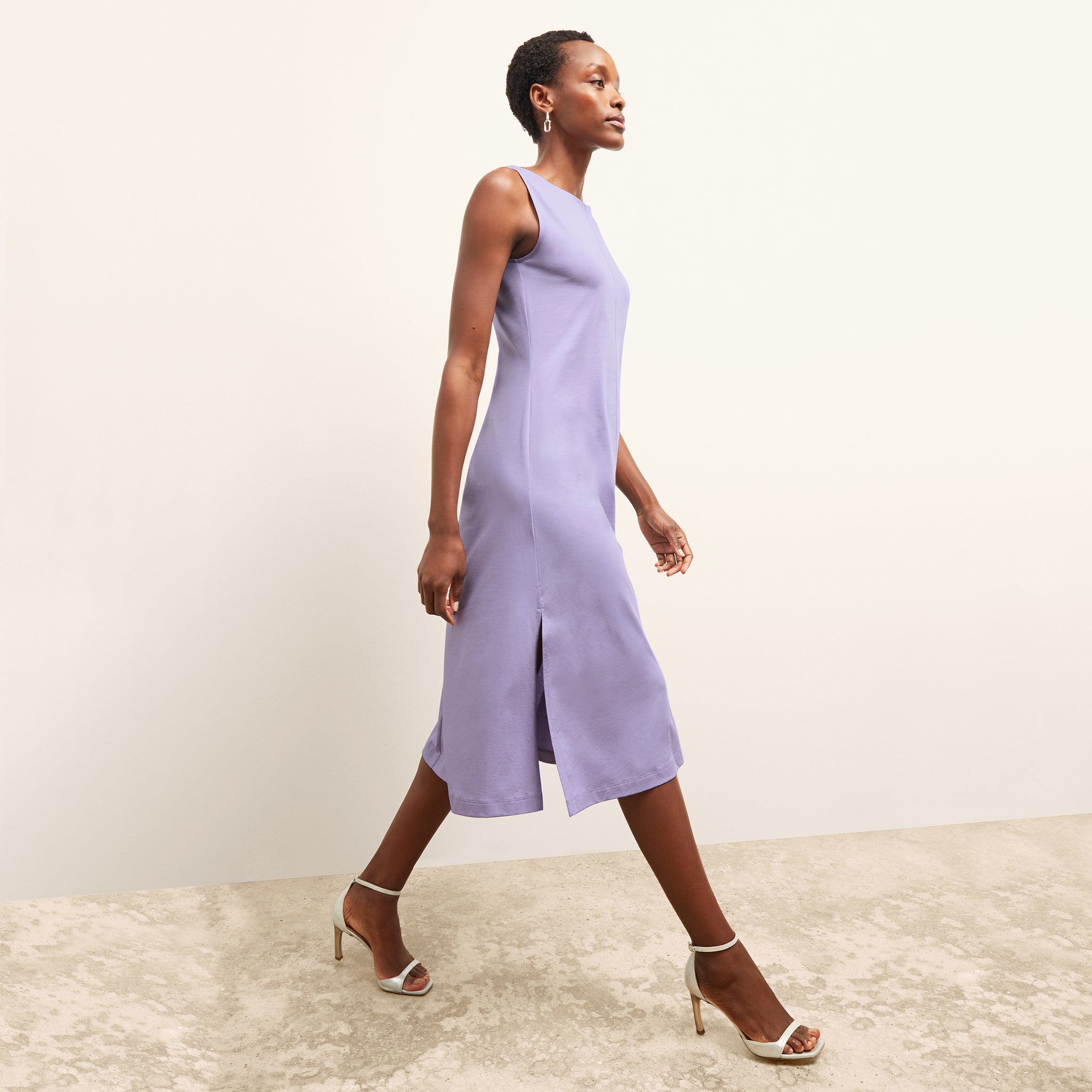 side image of a woman wearing the milano dress in light orchid