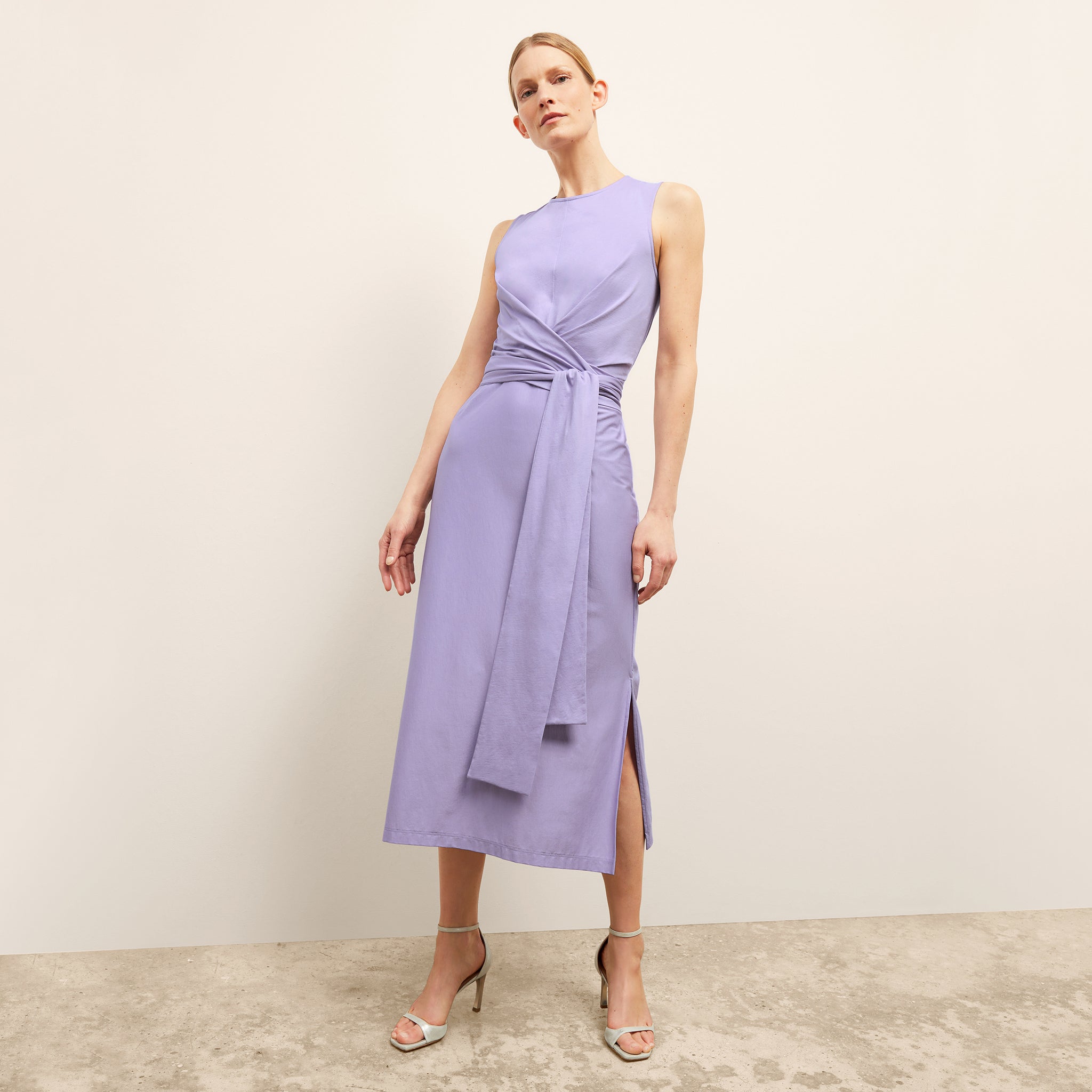 front image of a woman wearing the monte dress in light orchid 