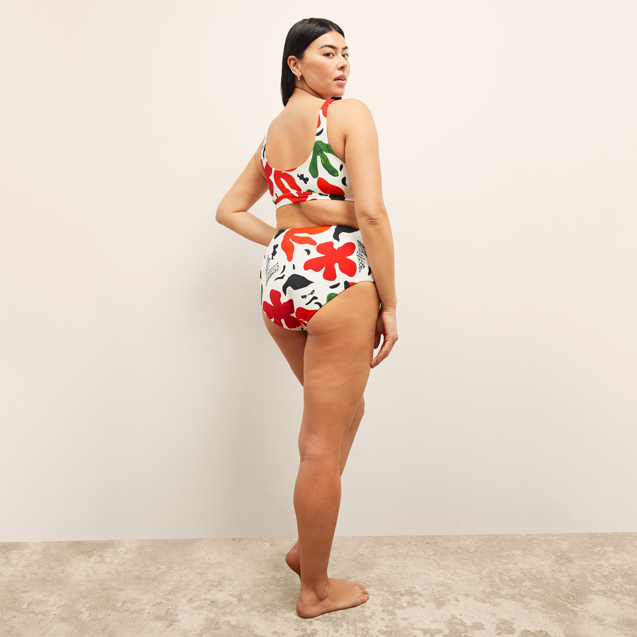 back image of a woman wearing the M.M.LaFleurxAndie Ventura Bikini top in Cutout Floral