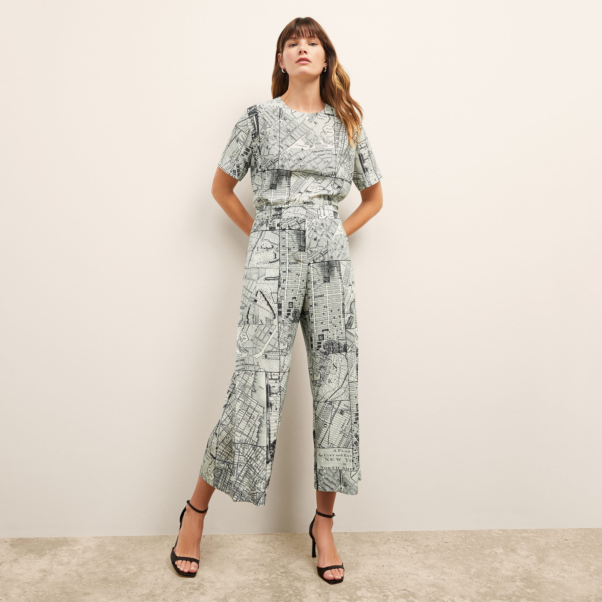 front image of a woman wearing the zhou pant in borough print