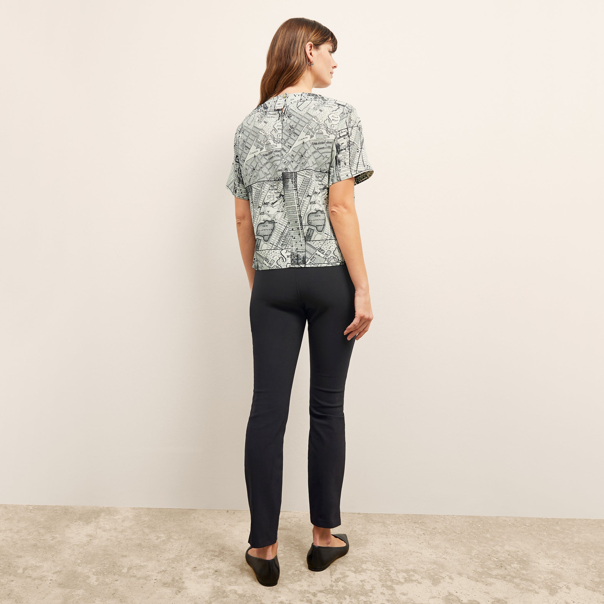back image of a woman wearing the annika top in borough print