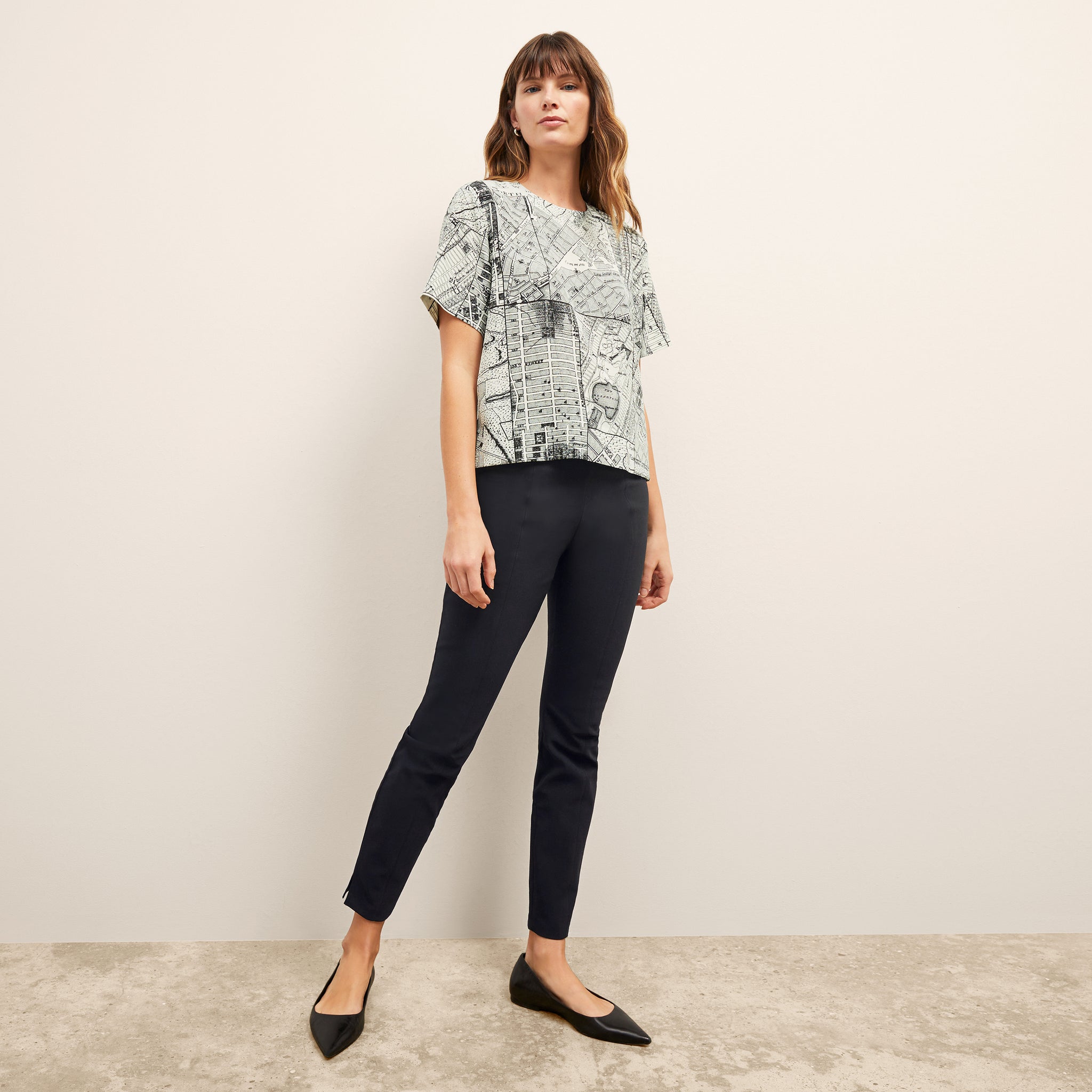 front image of a woman wearing the annika top in borough print