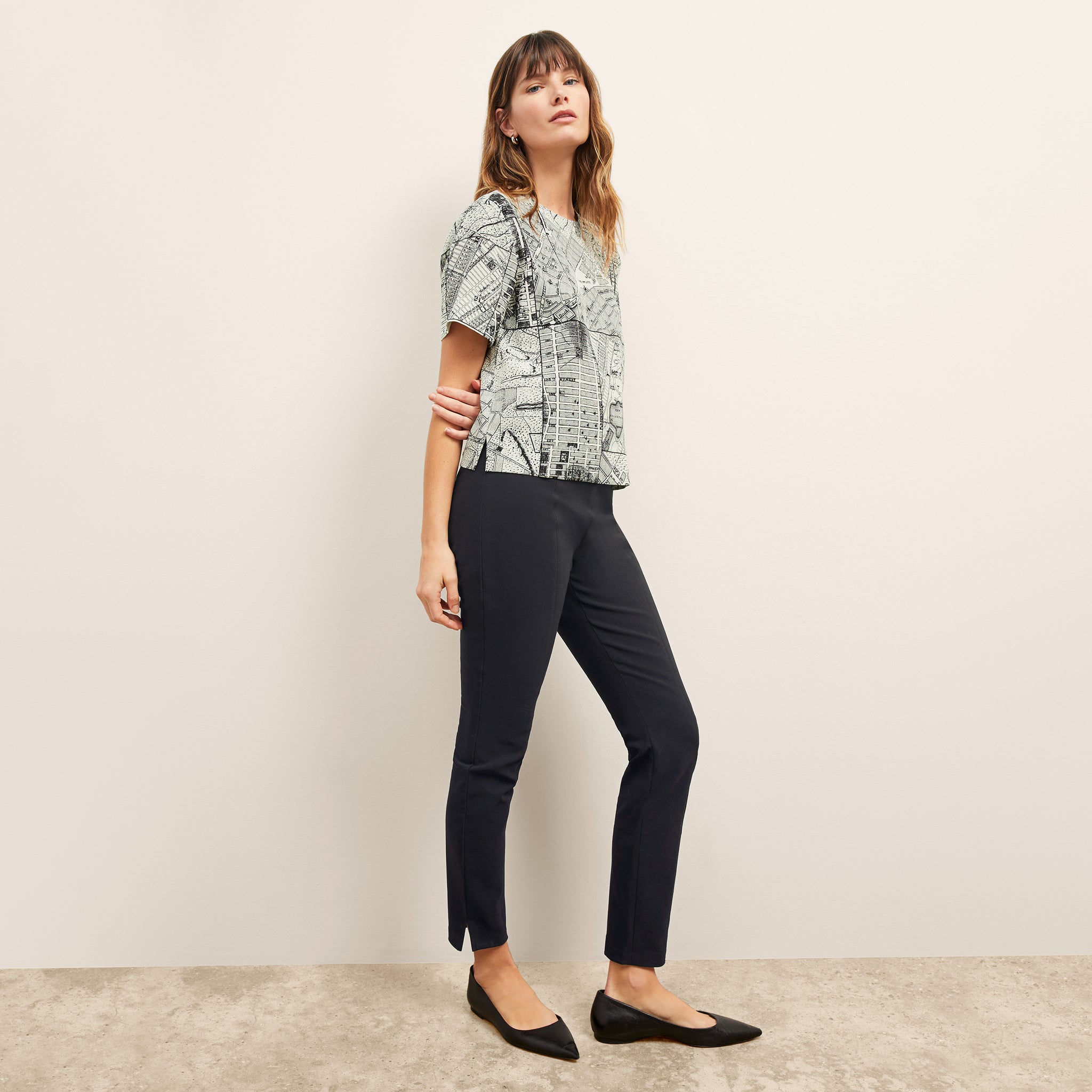 front image of a woman wearing the annika top in borough print