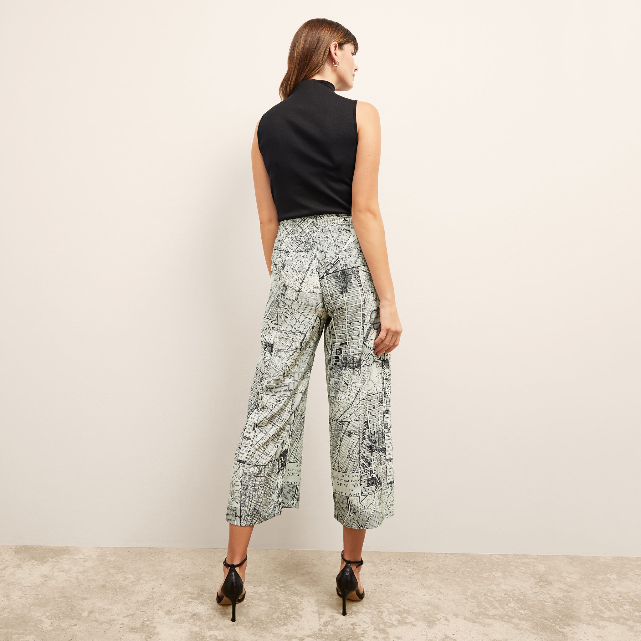 back image of a woman wearing the zhou pant in borough print