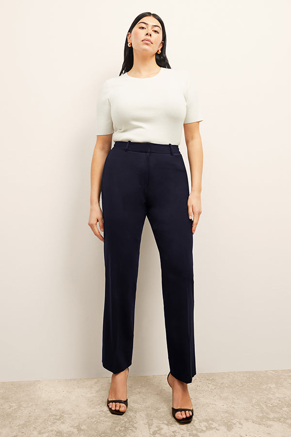 front image of a woman wearing the smith pant in galaxy blue 