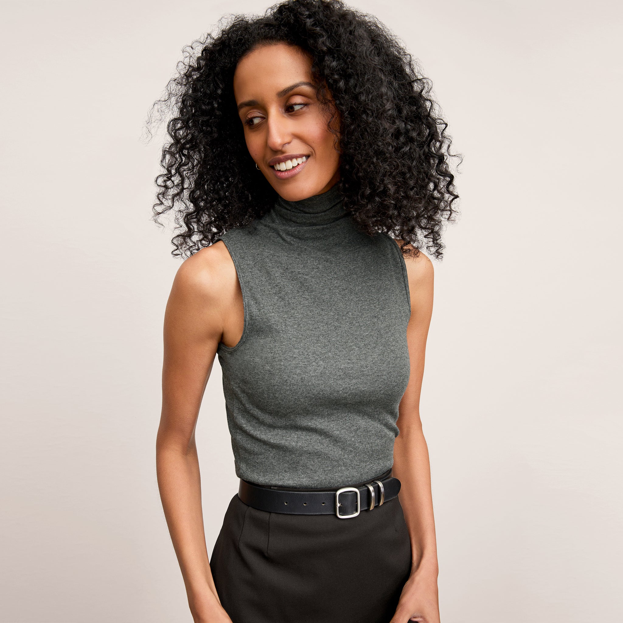 Front image of woman wearing the Jett Tank in Charcoal 