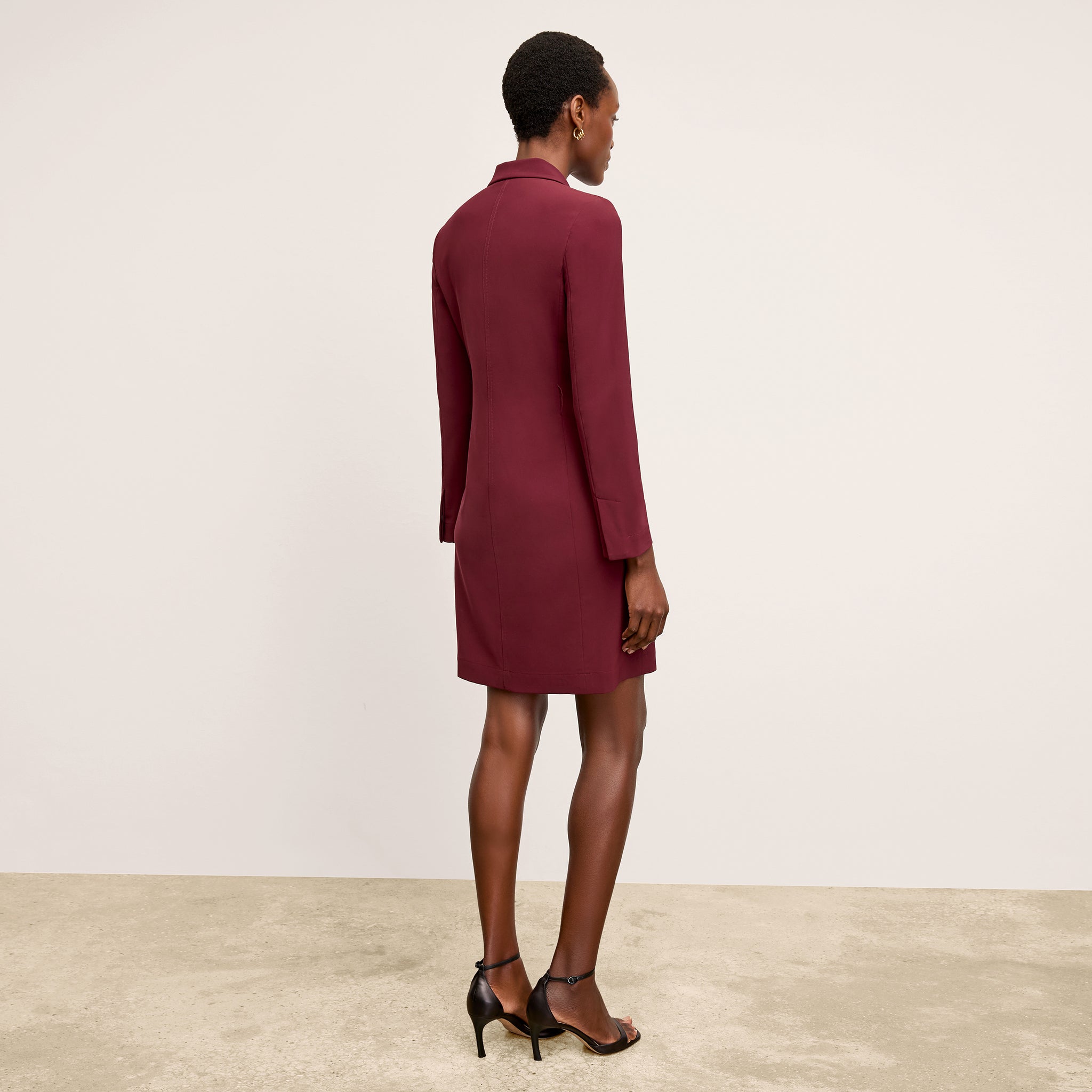 Back image of a woman wearing the Gwynne Dress in Berry Jam