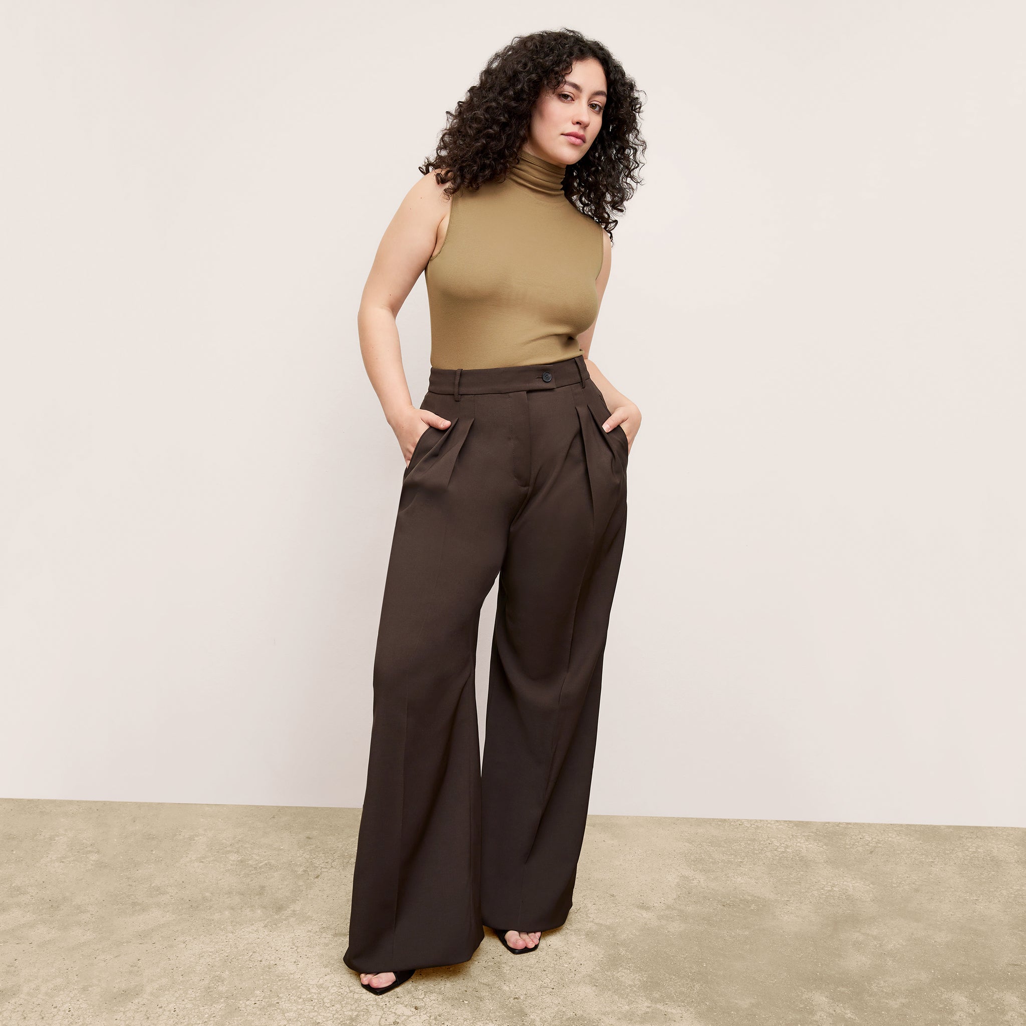 Front image of a woman wearing the Bia Pant in Date