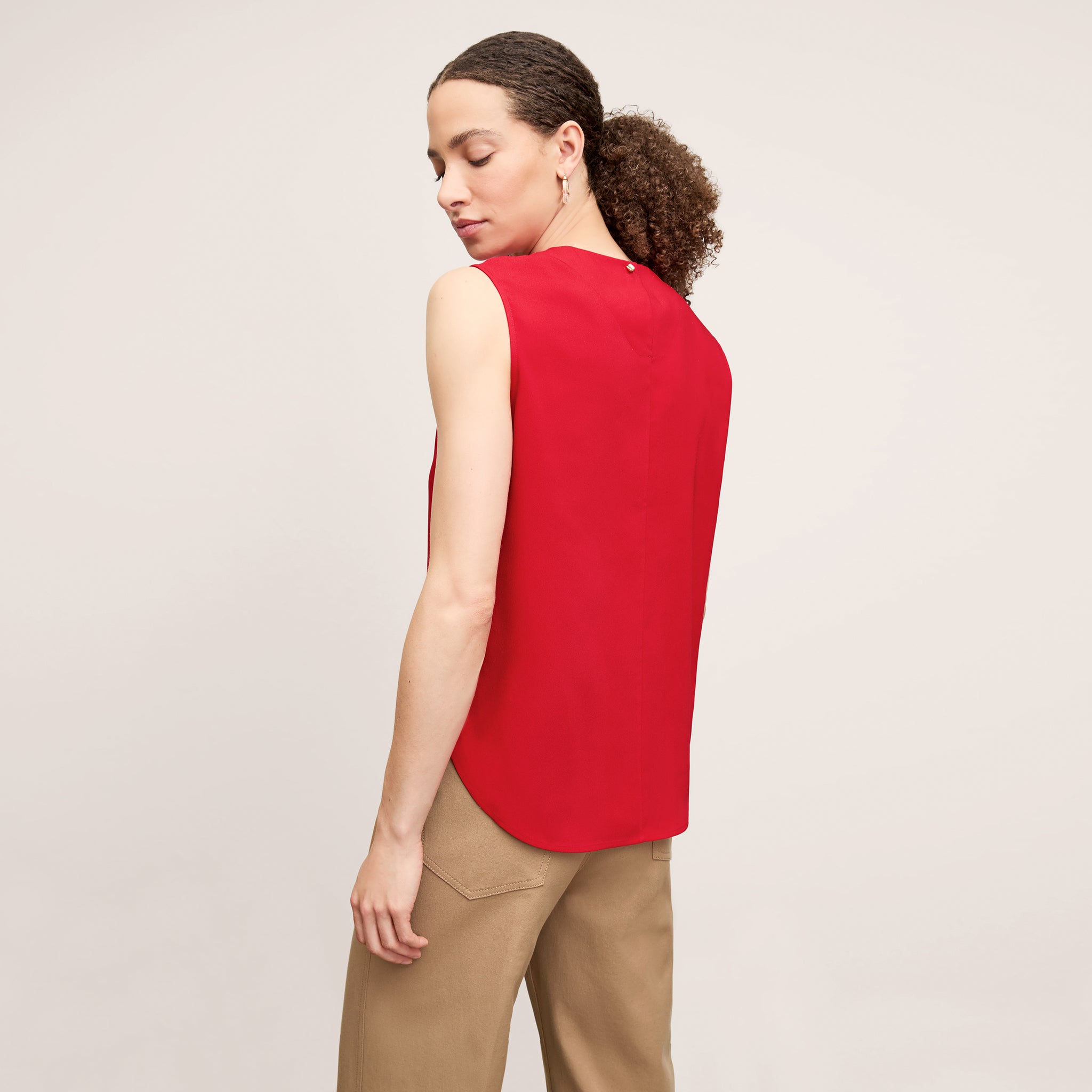 back image of a woman wearing the katrina top in maraschino