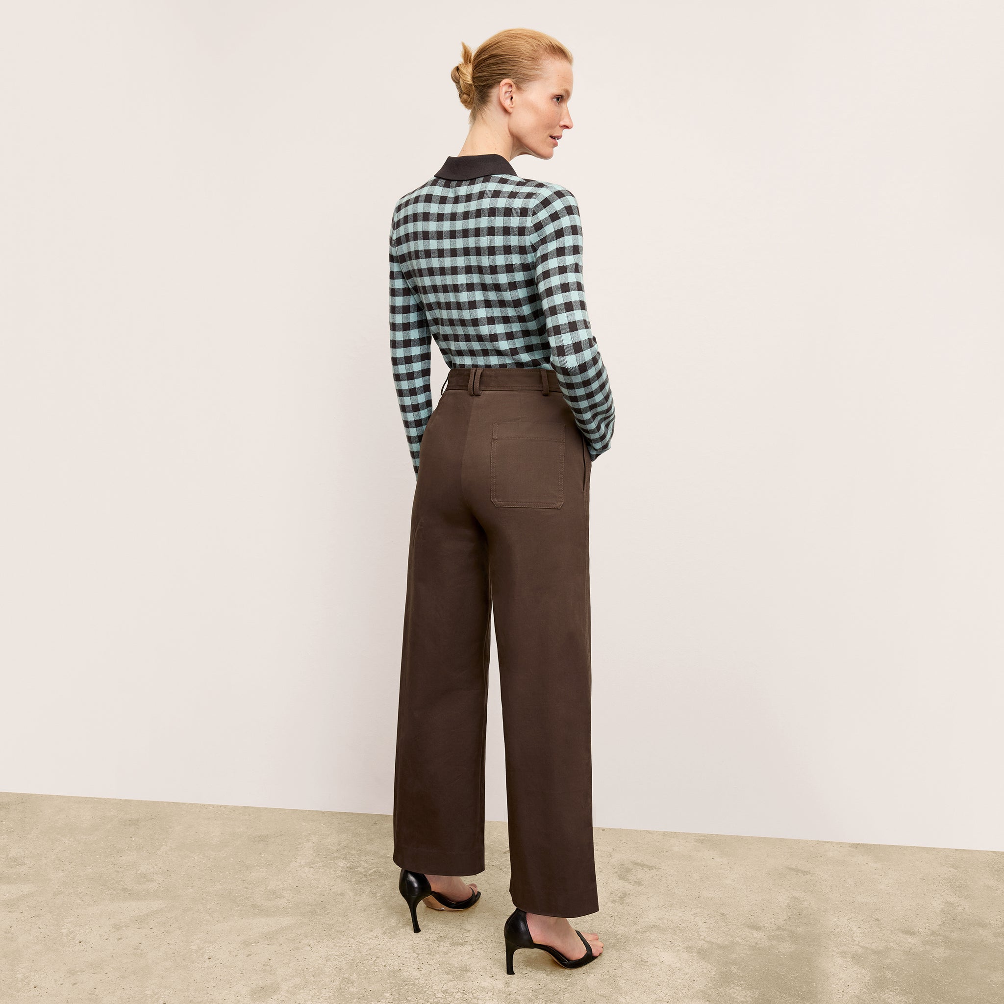 Back image of a woman wearing the Abby Pant in Date