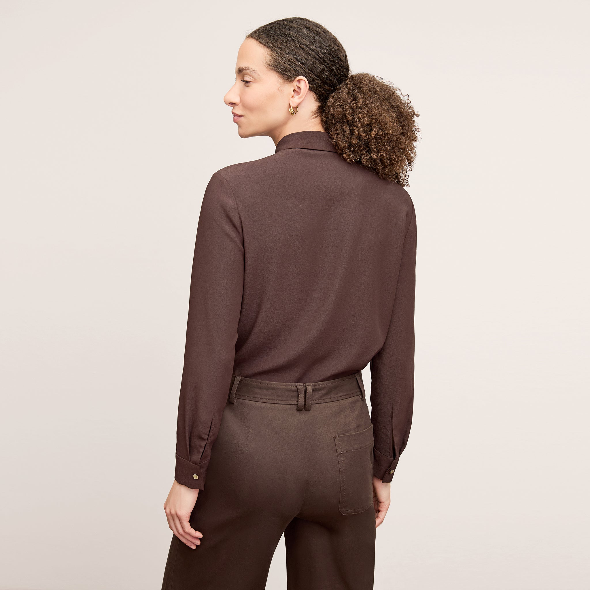 image of a woman wearing the lagarde top in espresso