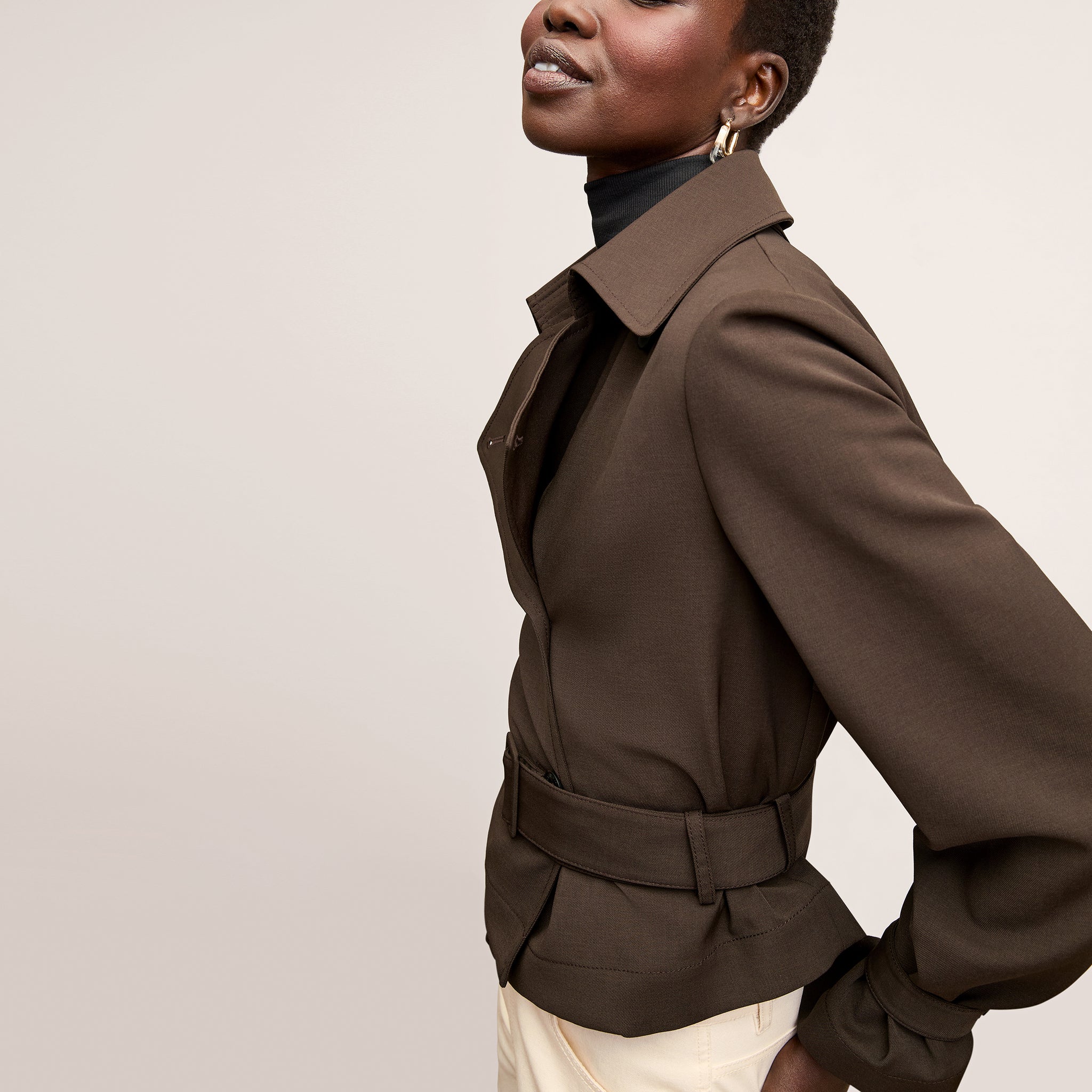 Side image of a woman wearing the Scotte Jacket in Date