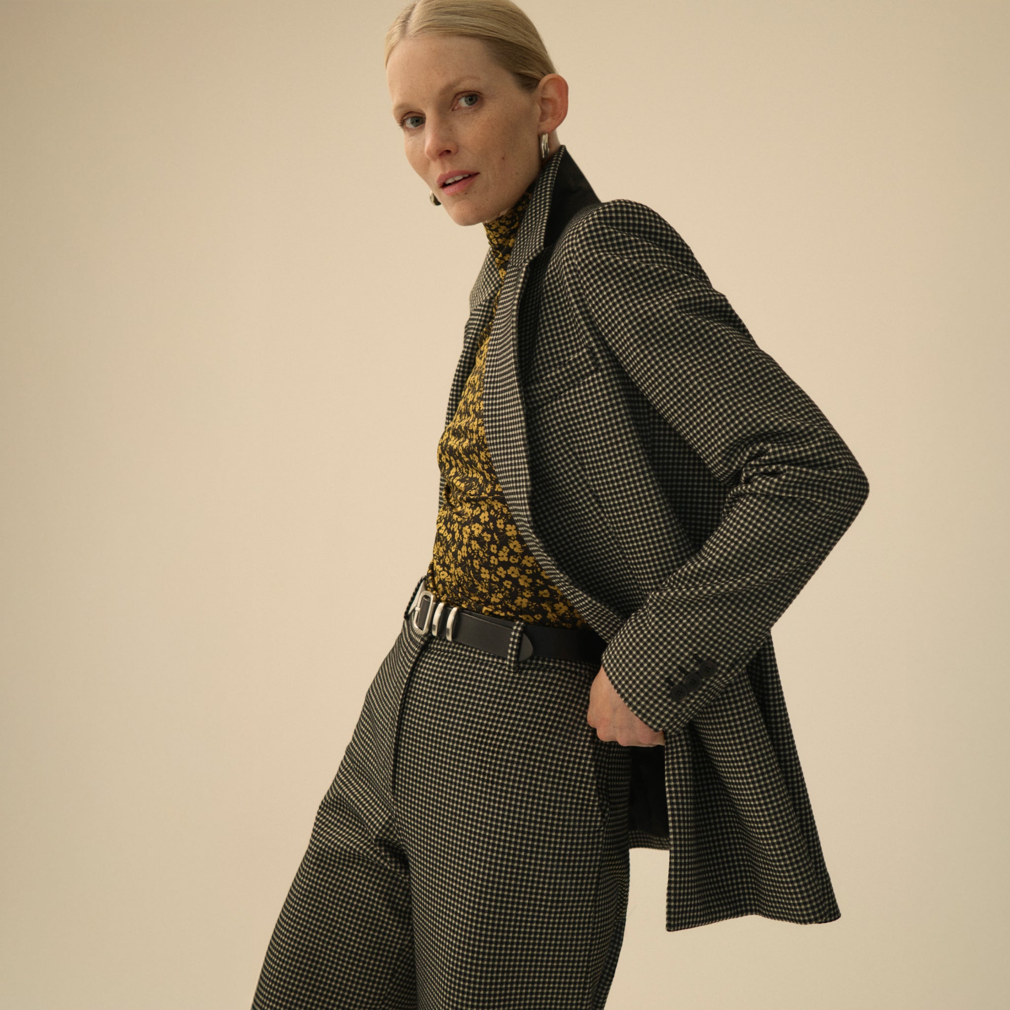 front image of a woman wearing the rossi blazer in classic check