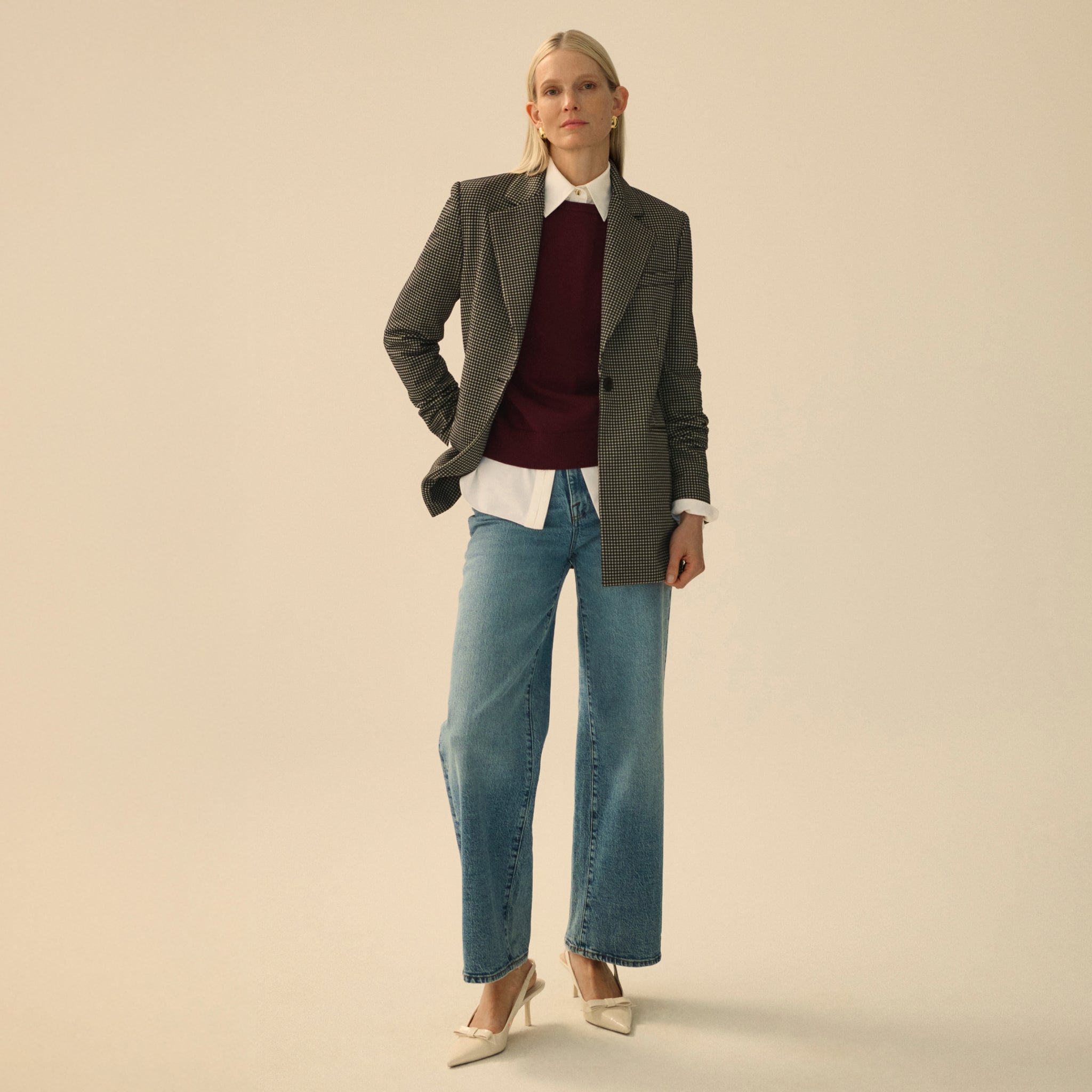 front image of a woman wearing the rossi blazer in classic check 