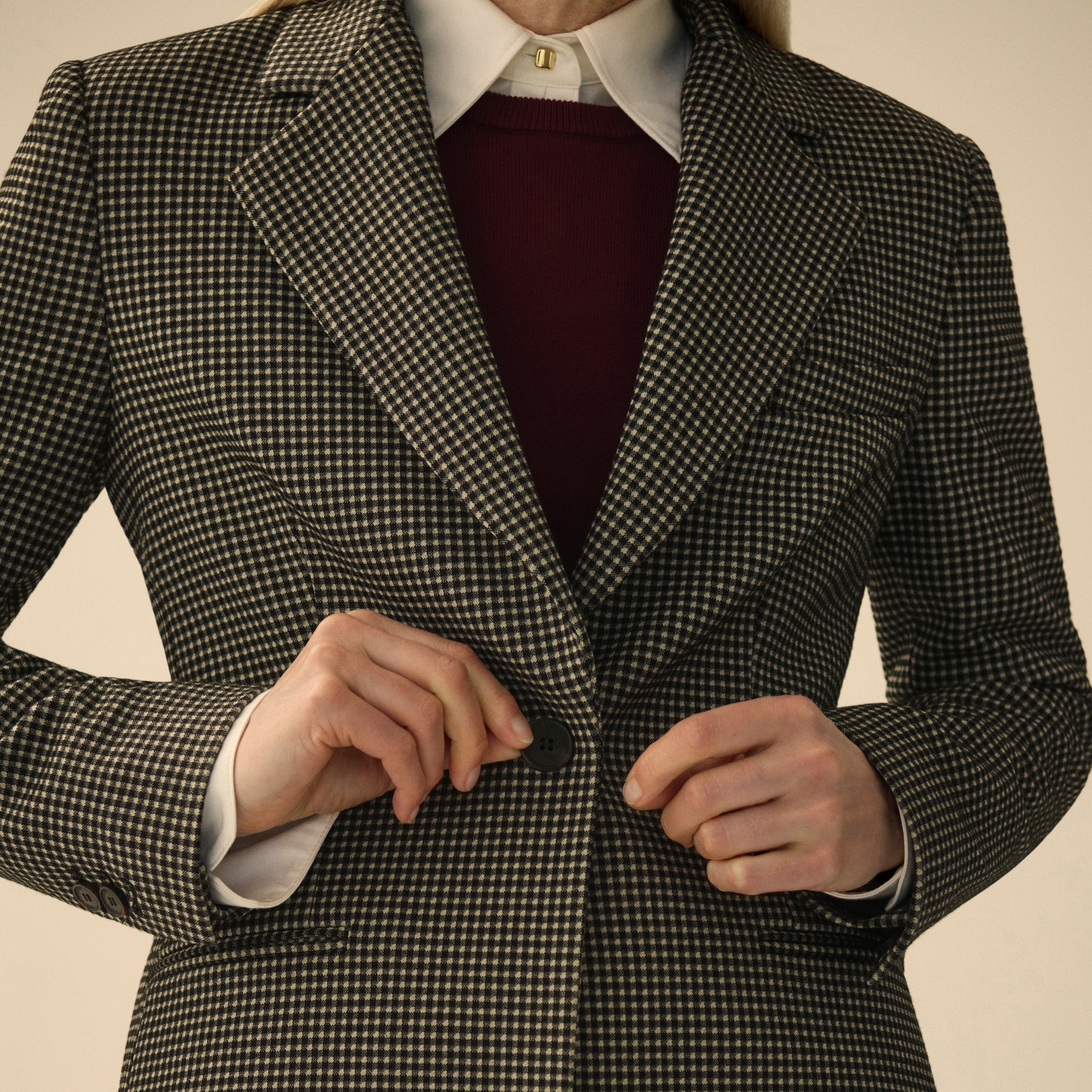 front image of a woman wearing the rossi blazer in classic check