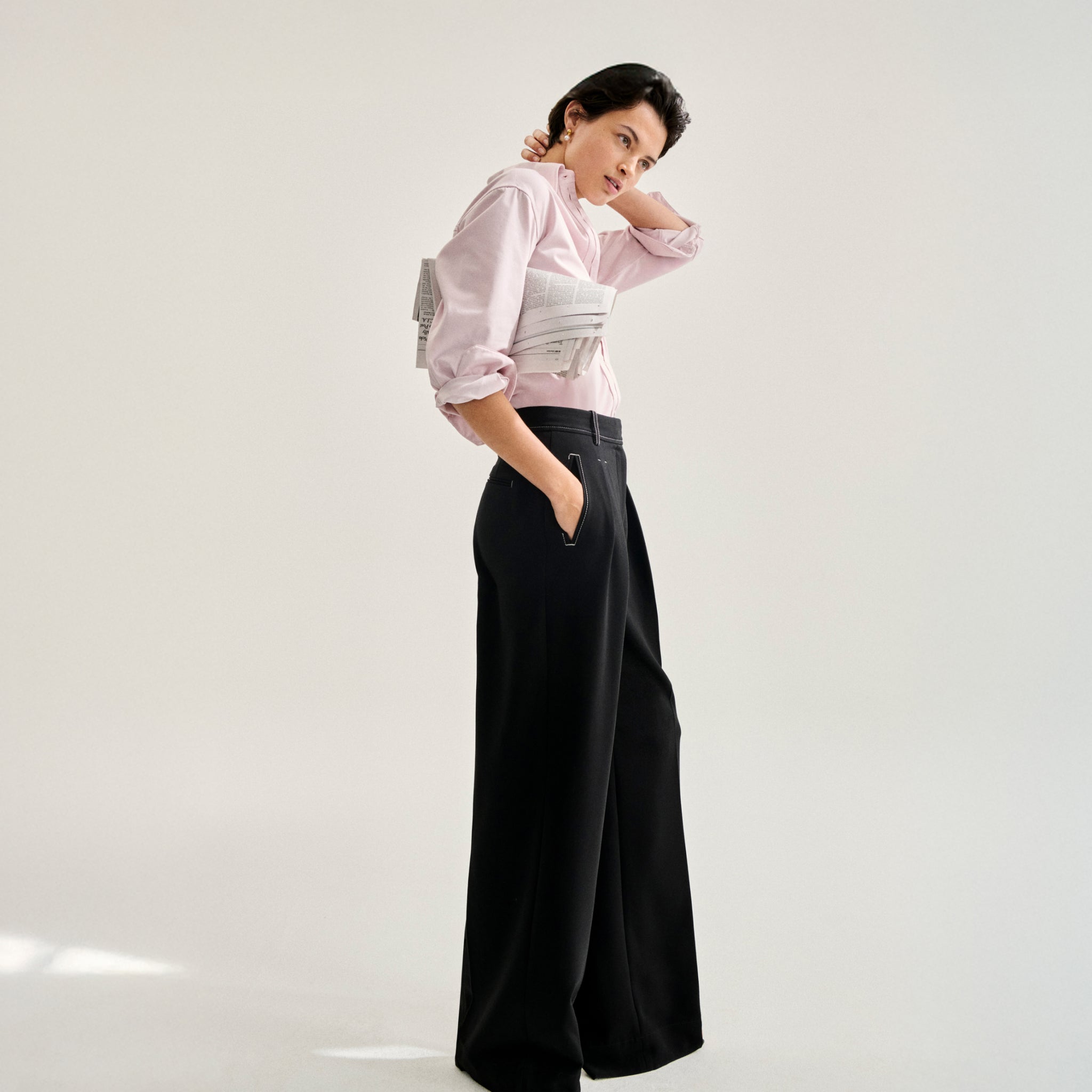 side image of a woman wearing the filomina top in tulip