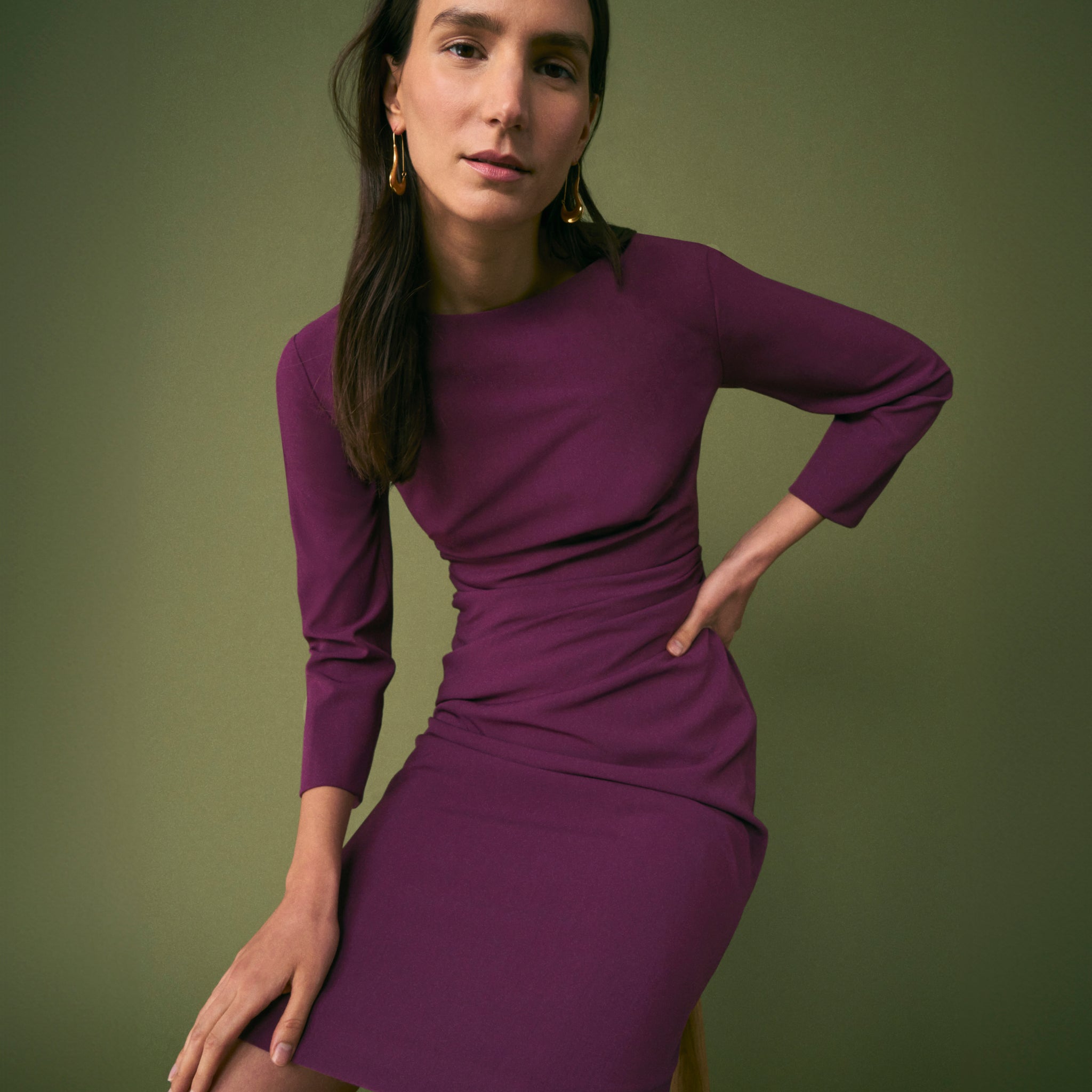 front image of a woman wearing the maxine dress in plumberry