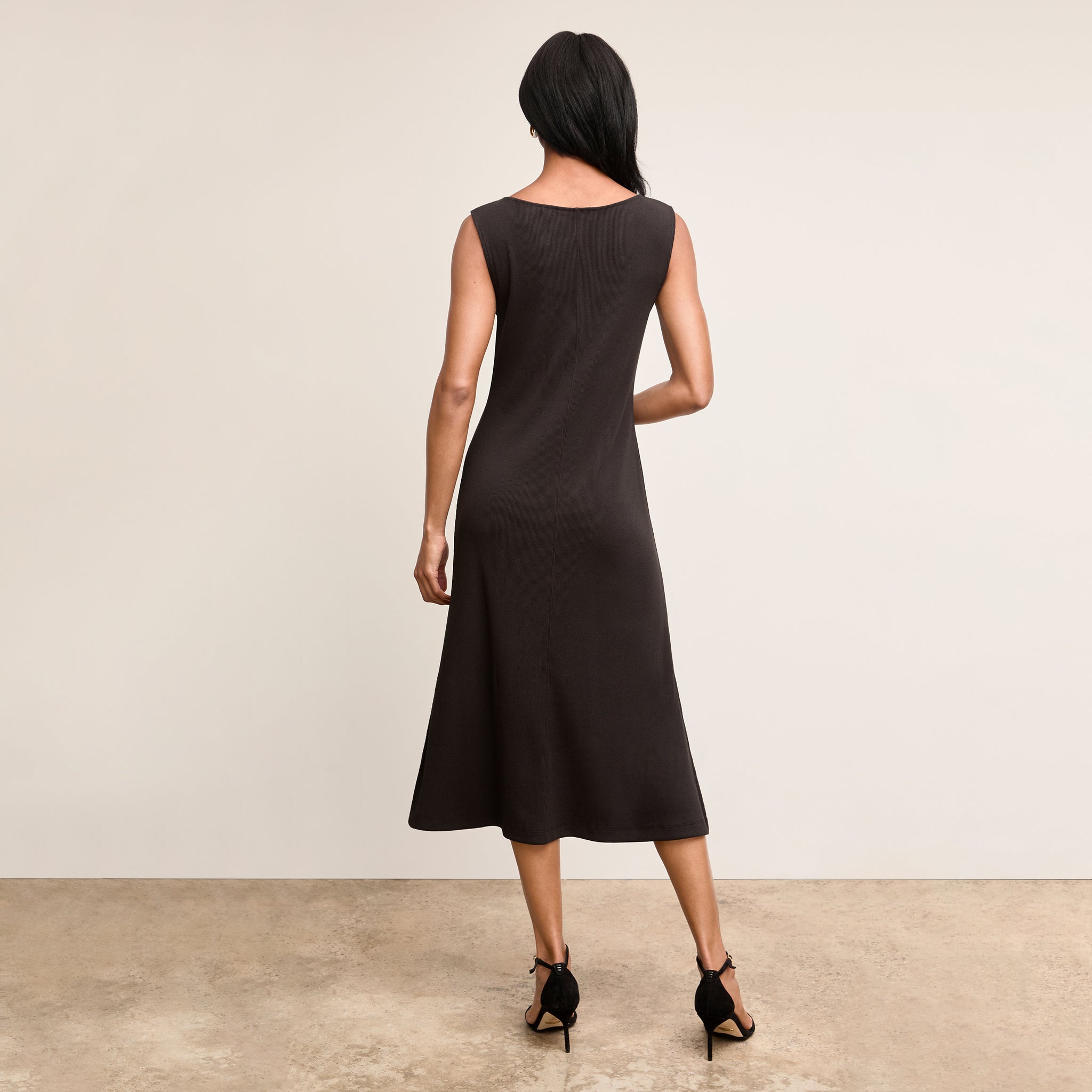 Back image of a woman wearing The Milano Dress - Ribbed Pima Modal :: Black