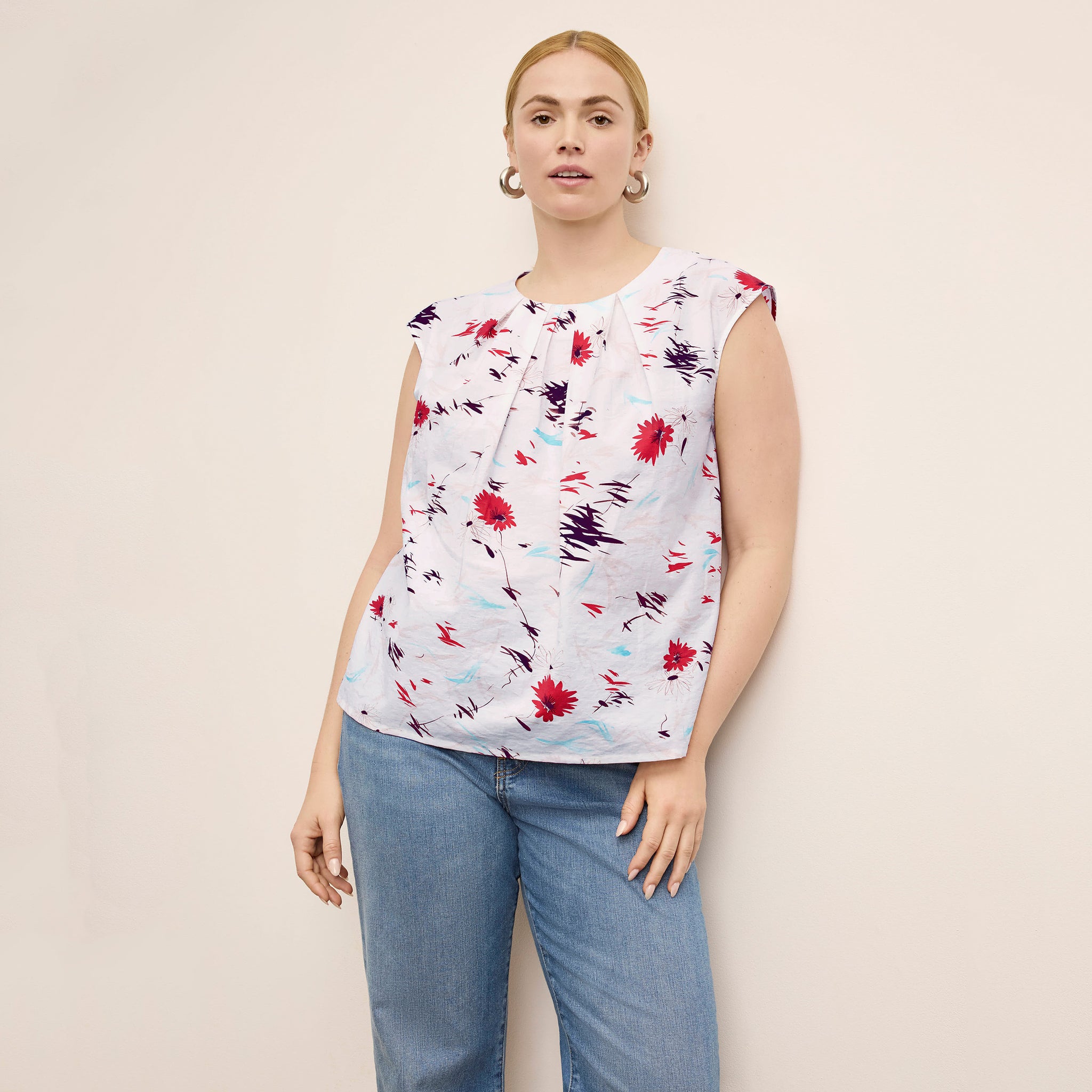 Front image of a woman wearing the Nika Top in Brushed Floral