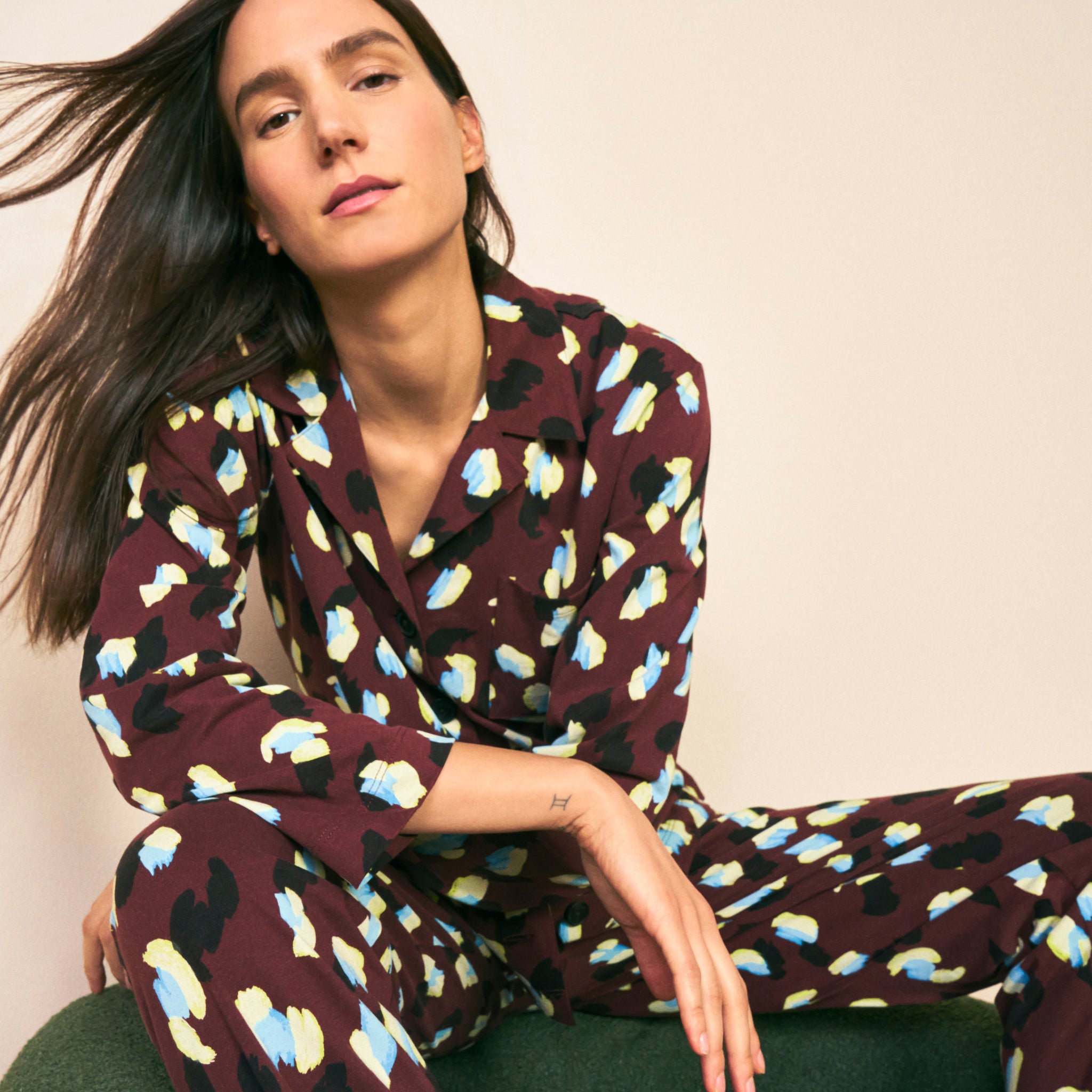mood image of a woman wearing the signature pajama set in bengal print