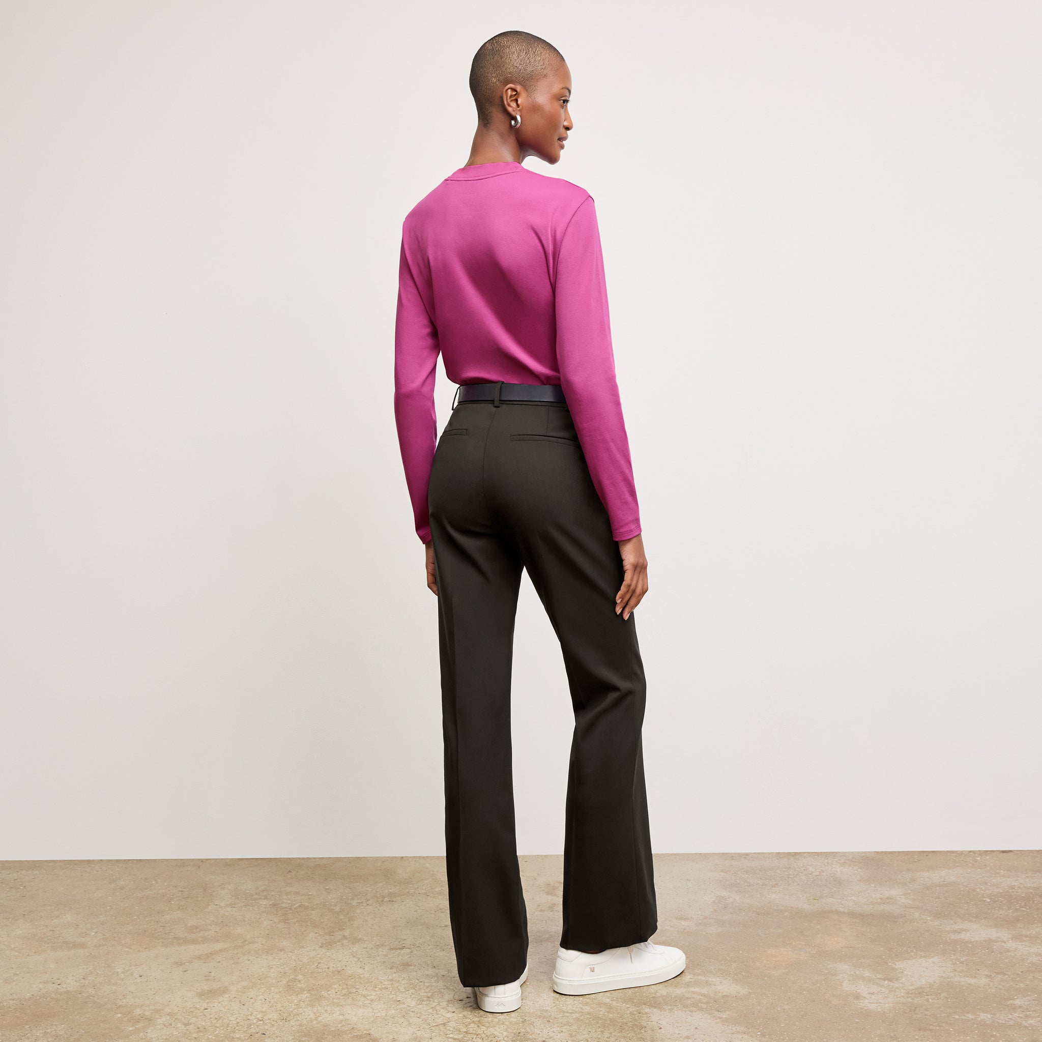 back image of a woman wearing the raquel t-shirt in pink berry