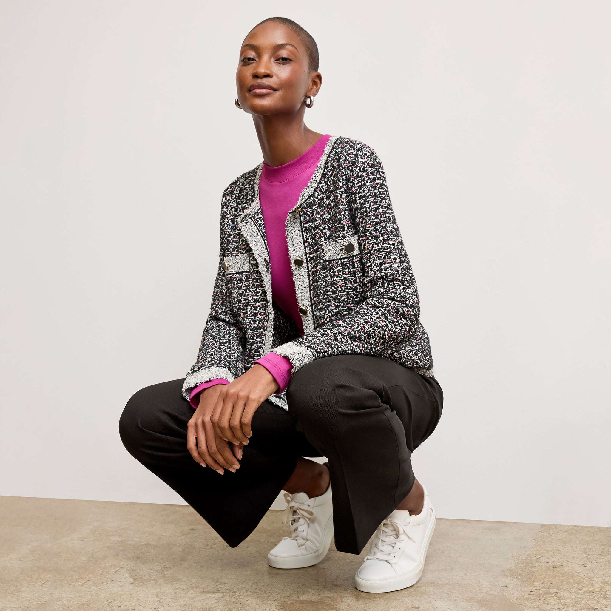 front image of a woman wearing the raquel t-shirt in pink berry