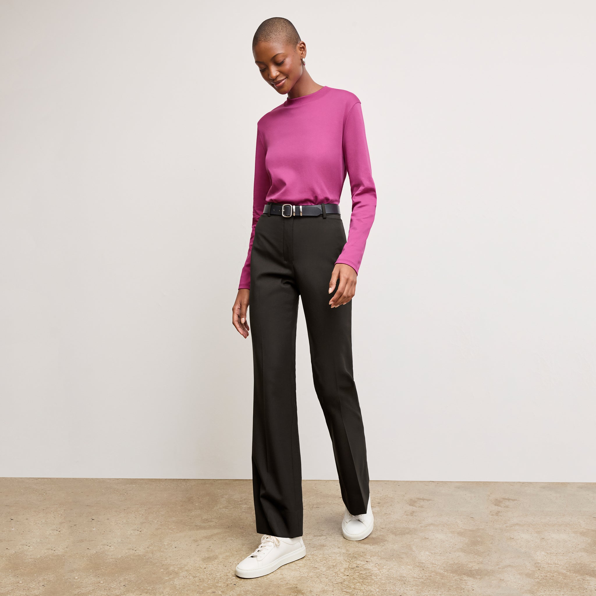 front image of a woman wearing the raquel t-shirt in pink berry