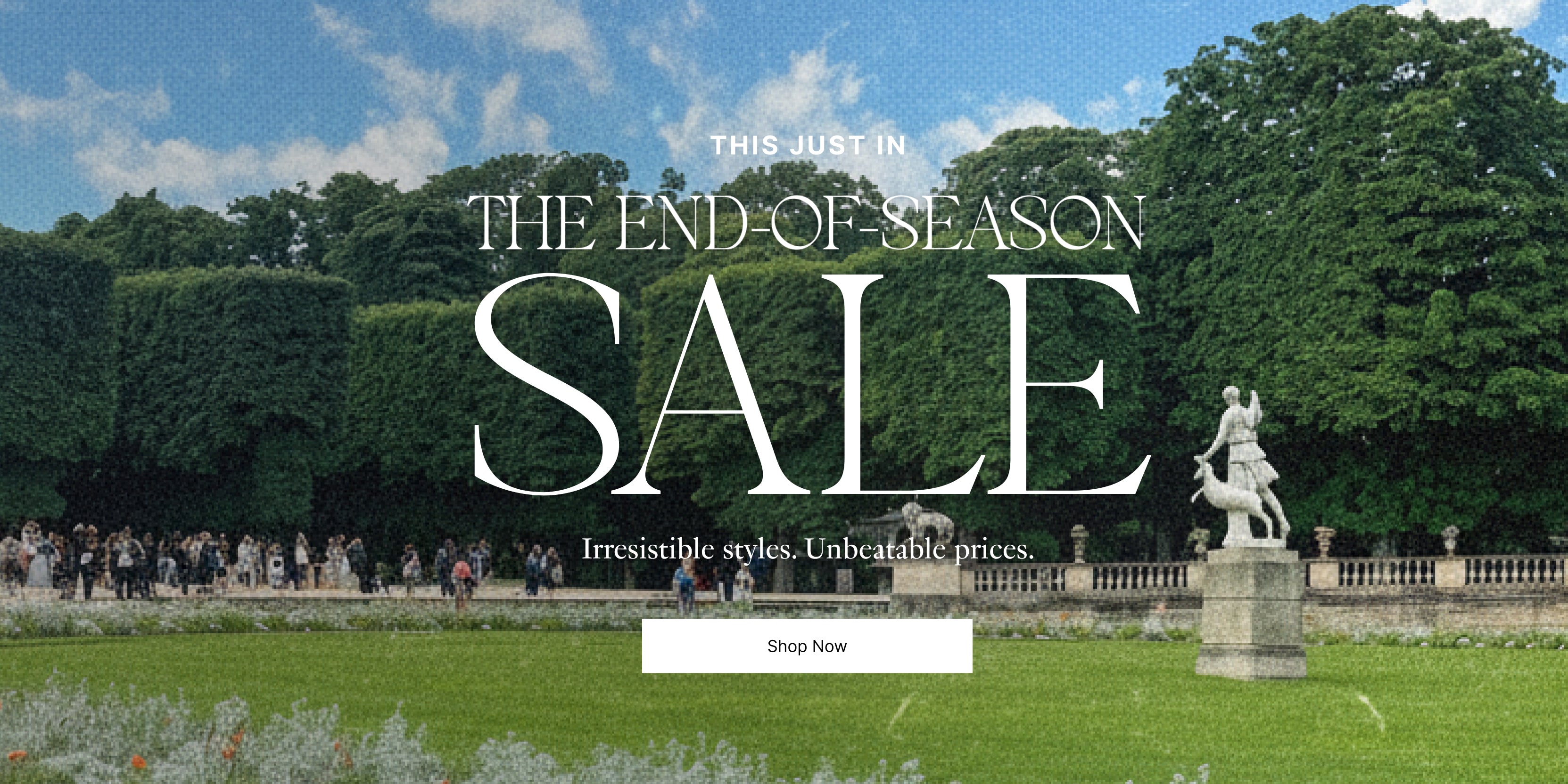 A promotional sale banner featuring a garden scene with large white text reading 'THIS JUST IN THE END OF SEASON SALE' 'Irresistible styles. Unbeatable prices.' and a 'Shop Now' button over a park background with trees, lawn, and a statue.