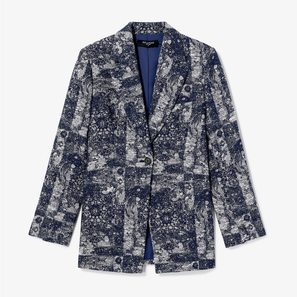 Floral patterned blazer on a light gray background