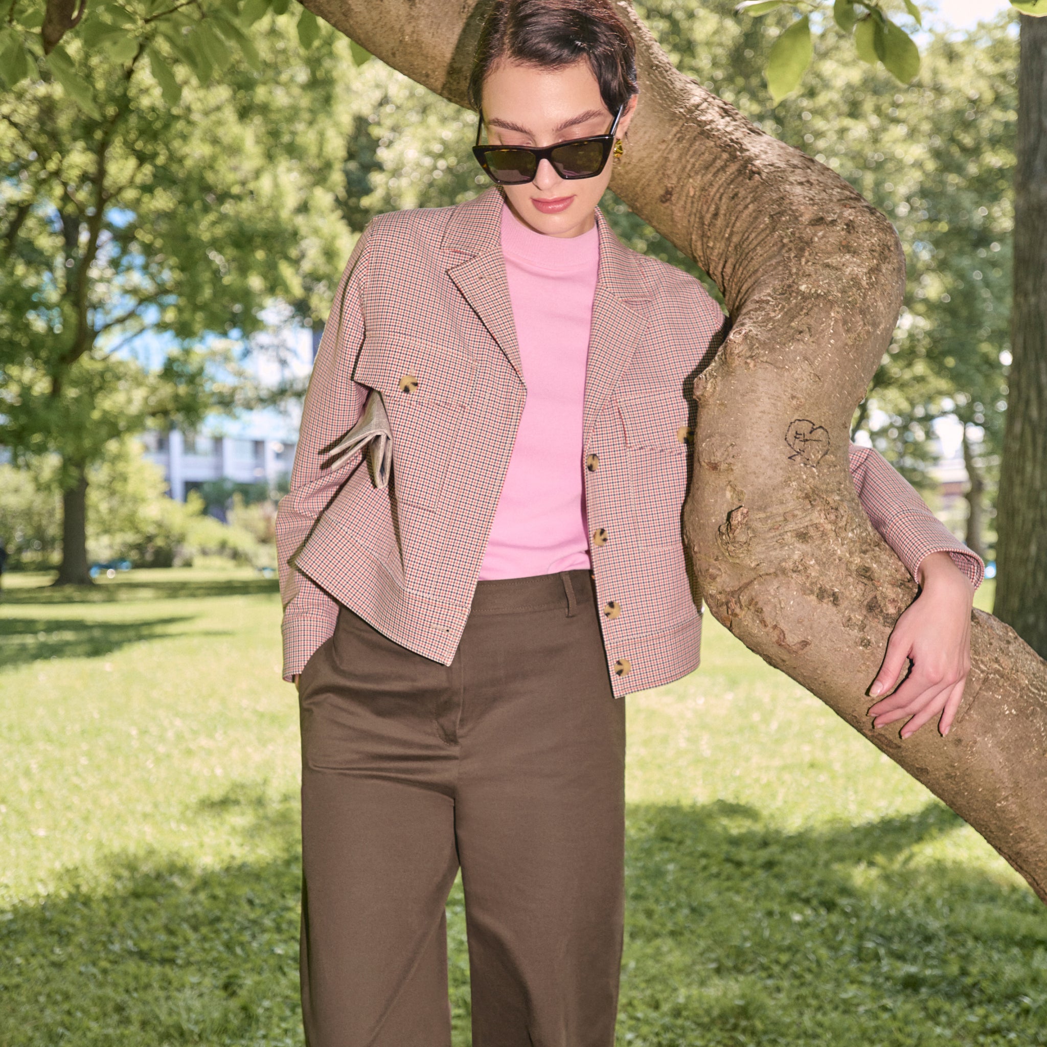 front image of a woman wearing the shani top in taffy