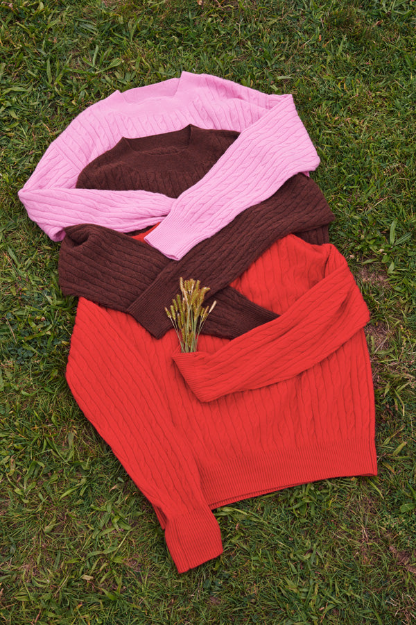 Model wearing a scarf in the season's colors