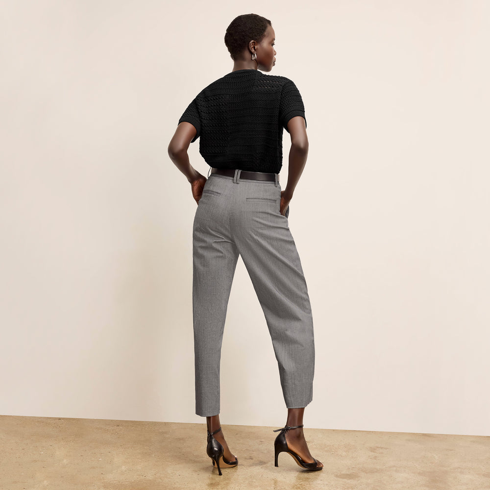 Back image of a woman wearing the Sina top in black