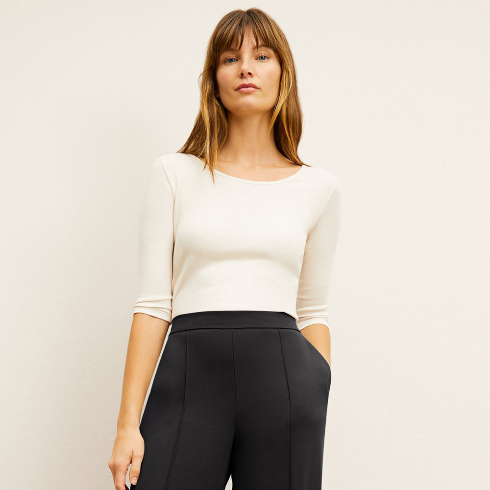 Front image of a woman wearing the Soyoung top in Ivory