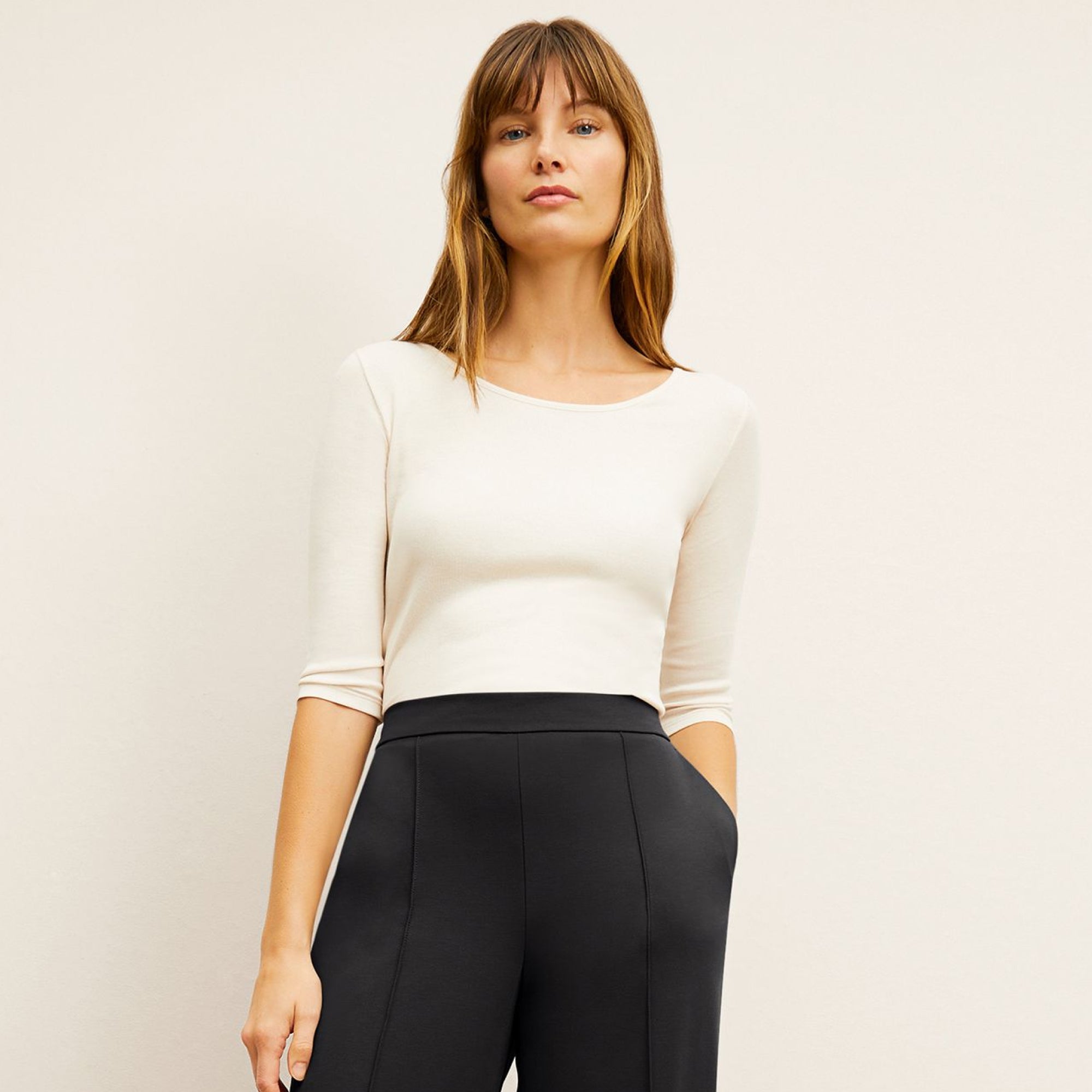 Front image of a woman wearing the Soyoung top in Ivory 