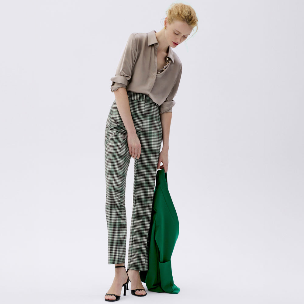 front image of a woman wearing the smith pant in check plaid
