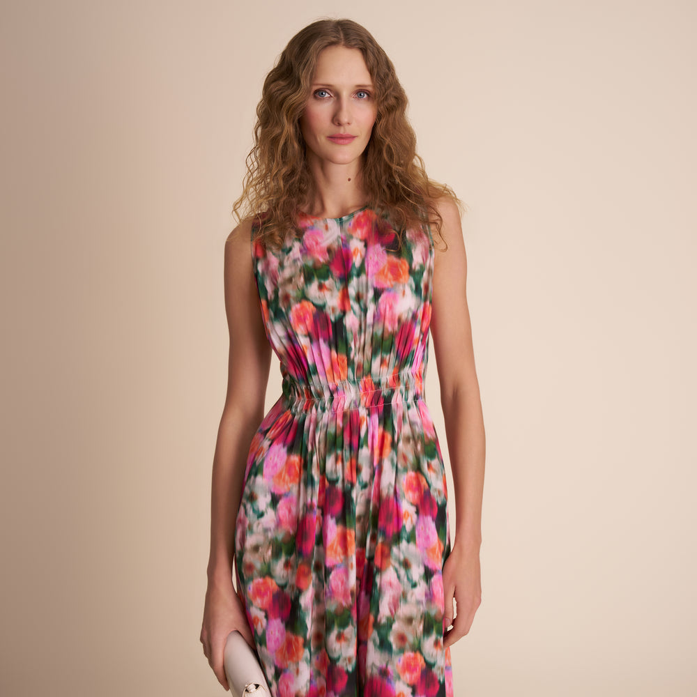 Woman in floral print dress.