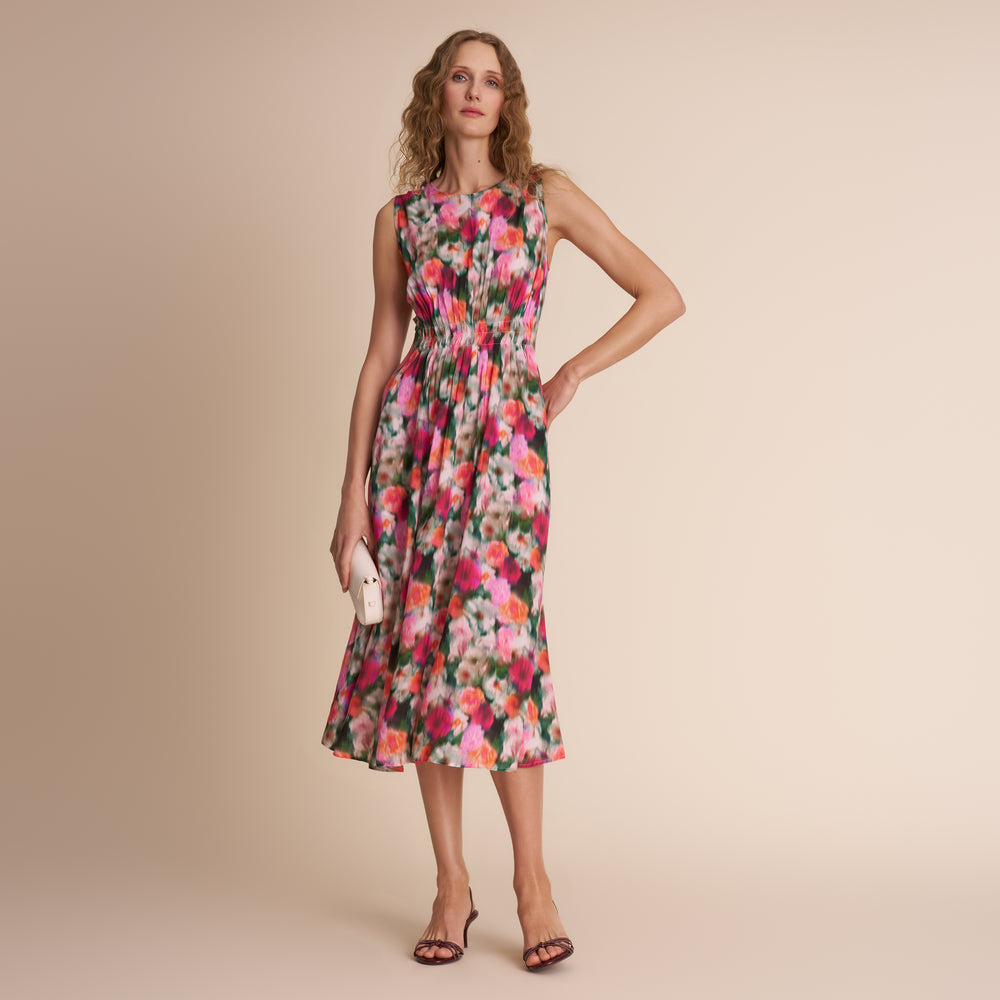 Woman in floral print dress.