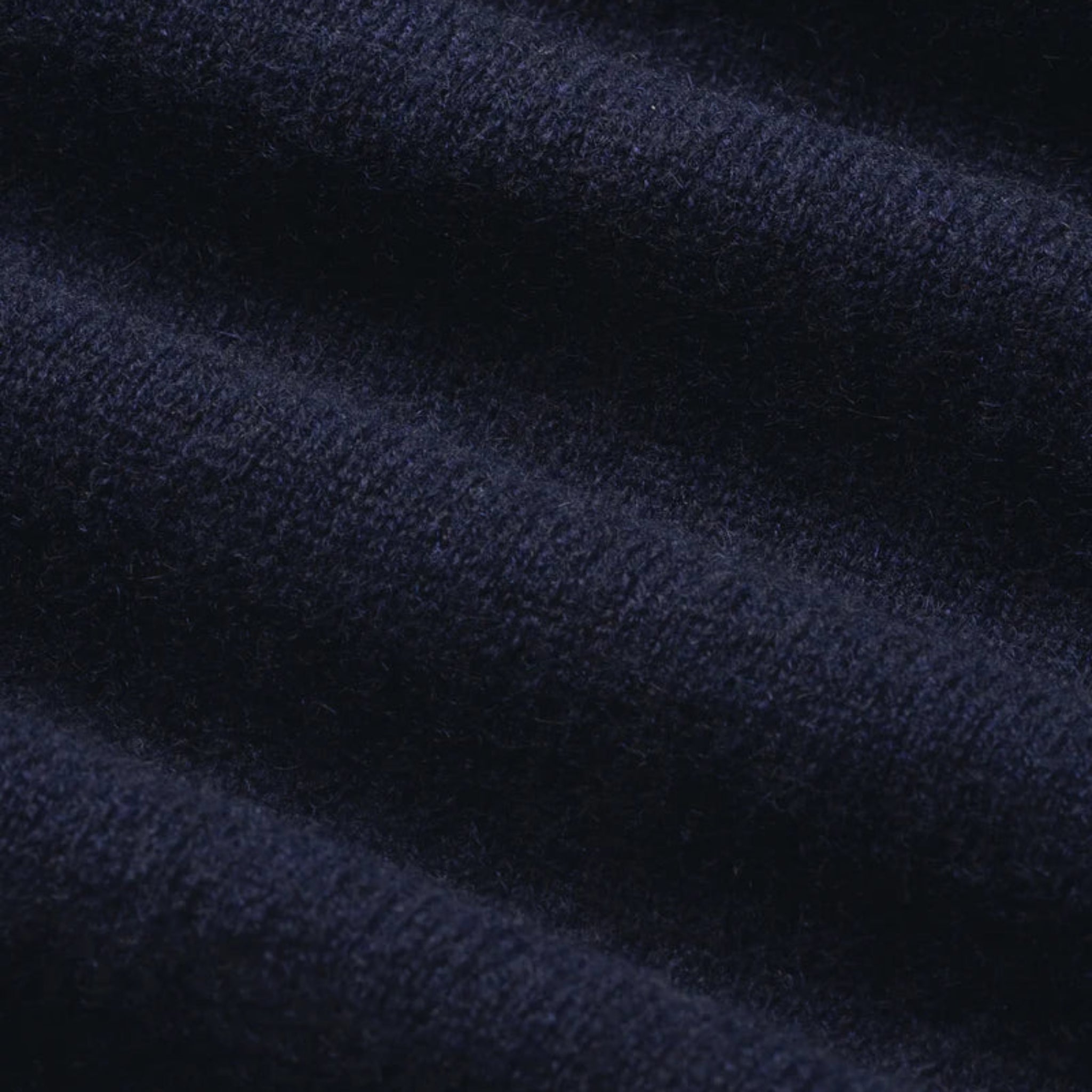 Close-up of dark blue fabric texture