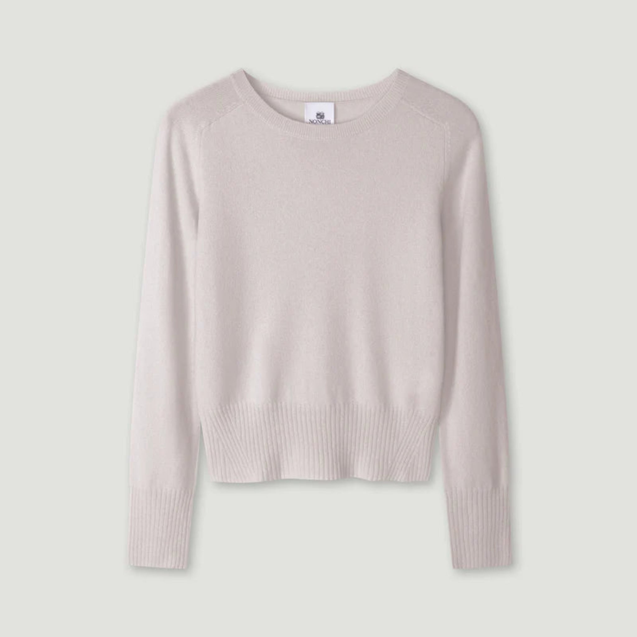 Light gray sweater on a light gray background 