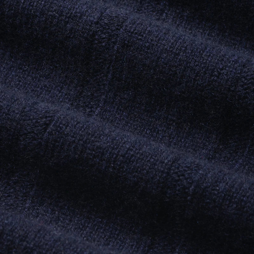 Close-up of dark blue fabric texture