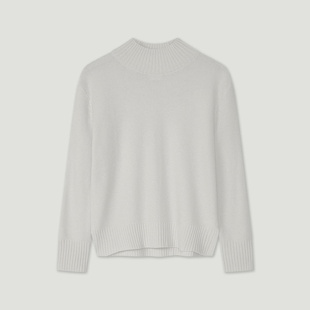 Light gray sweater on a light gray background