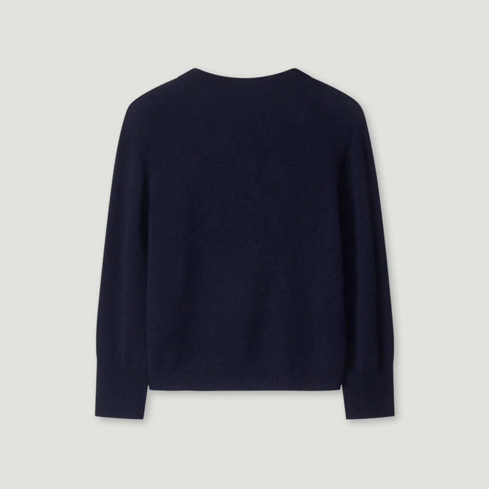 Navy blue sweater on a light gray background