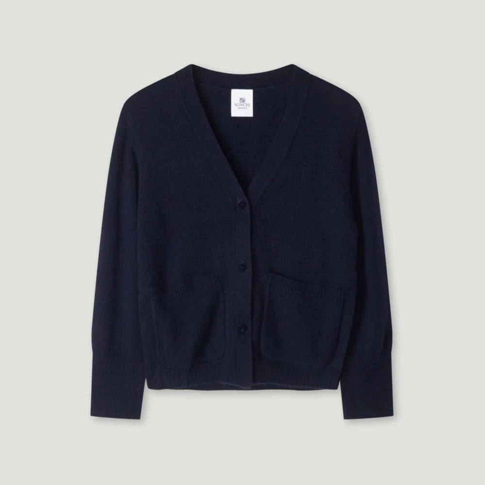 Navy blue cardigan on a light gray background