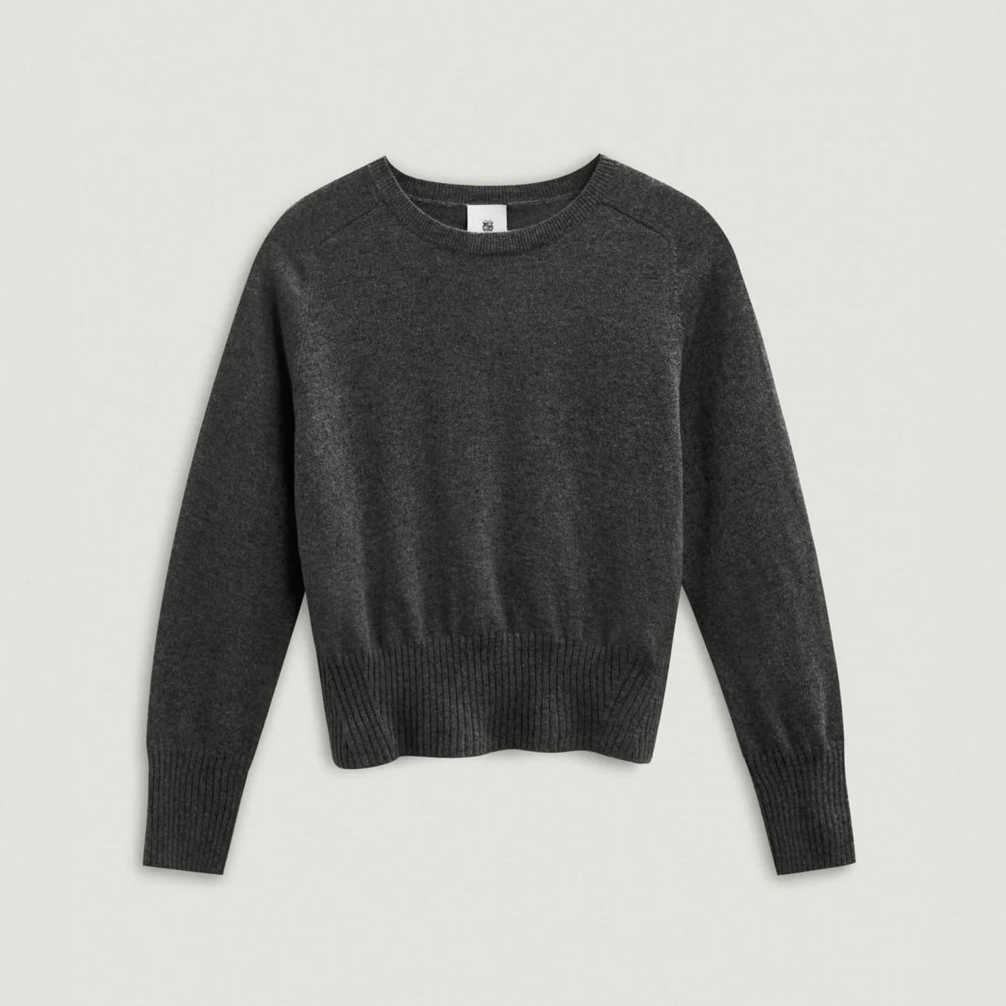 Dark gray sweater on a light gray background 
