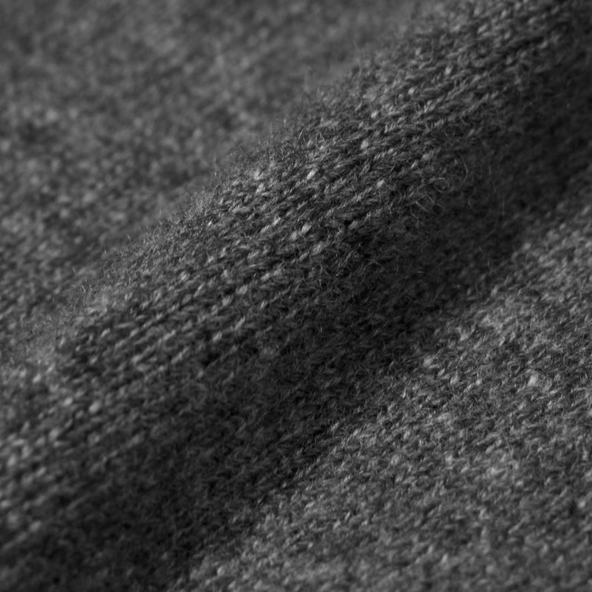 Close-up of dark gray fabric texture